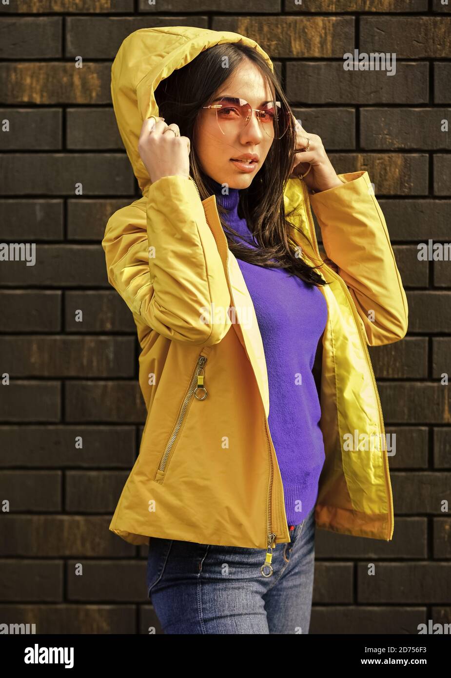 Girl short jacket urban style. Feel authentic. Female psychology. Woman  fashion model outdoors. Woman enjoy cool weather. Matching style and class  with luxury and comfort. Fashion outfit. Windy day Stock Photo 