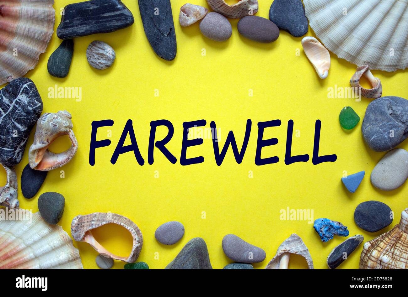 Text 'farewell' on a beautiful yellow background. Sea stones and seashells.  Concept Stock Photo - Alamy
