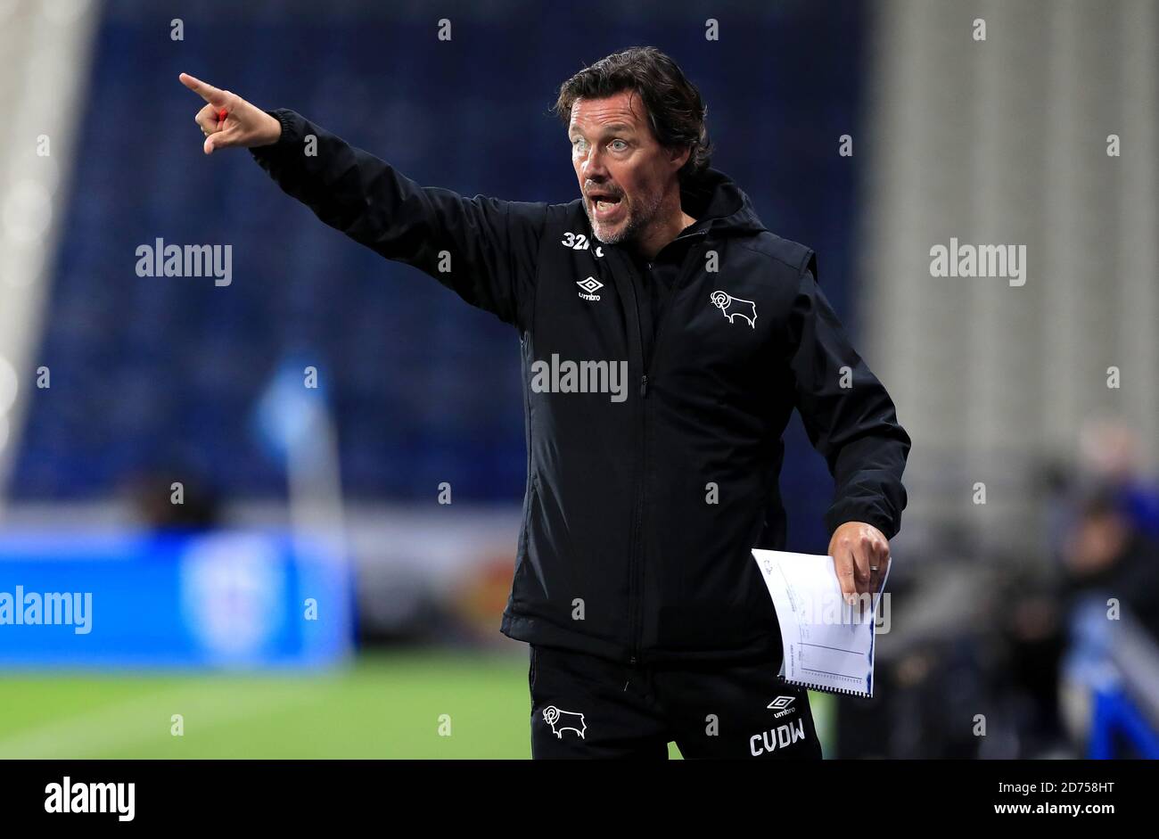 Derby County assistant manager Chris van der Weerden instructs his players during the Sky Bet Championship match at The John Smith's Stadium, Huddersfield. Stock Photo