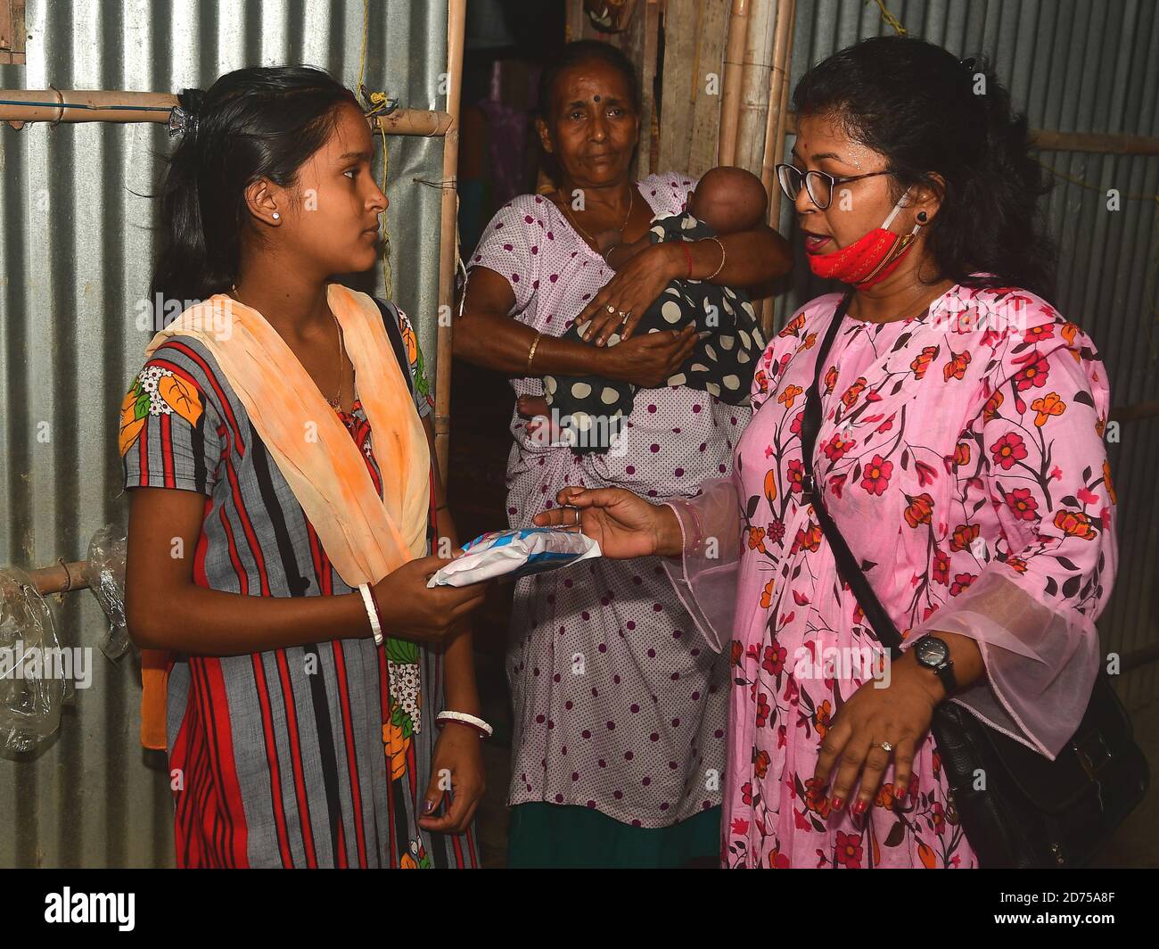 A group of social responsible people in Tripura distributed sanitary pads to slum dwellers on the occasion of national period Porn Photo