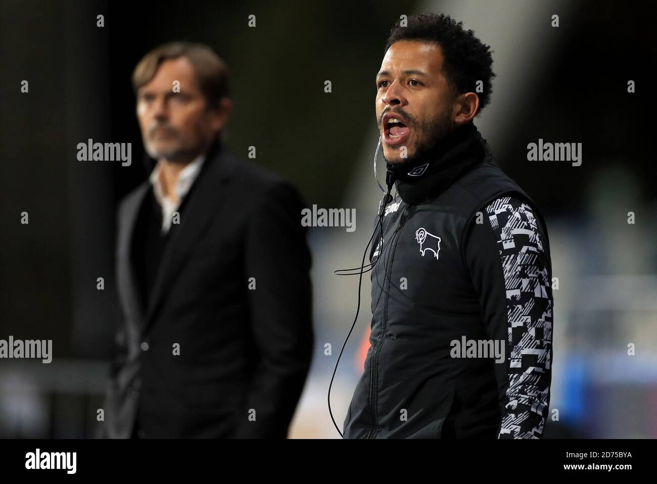 Derby County specialist first team coach Liam Rosenior (right) during the Sky Bet Championship match at The John Smith's Stadium, Huddersfield. Stock Photo