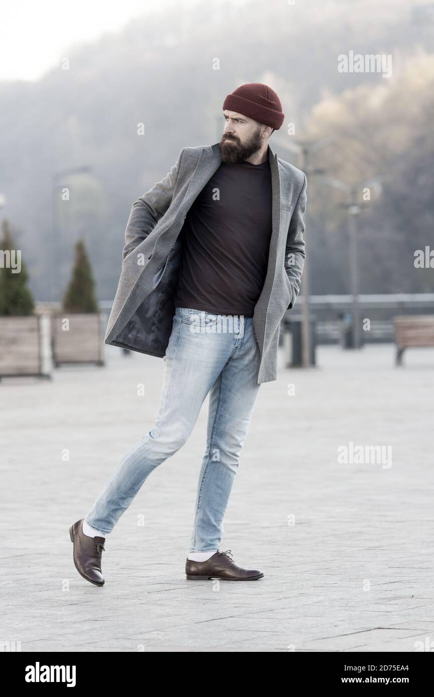 Hipster outfit and hat accessory. Stylish casual outfit spring season.  Menswear and male fashion concept. Man bearded hipster stylish fashionable  coat and hat. Comfortable outfit. Lumbersexual style Stock Photo - Alamy