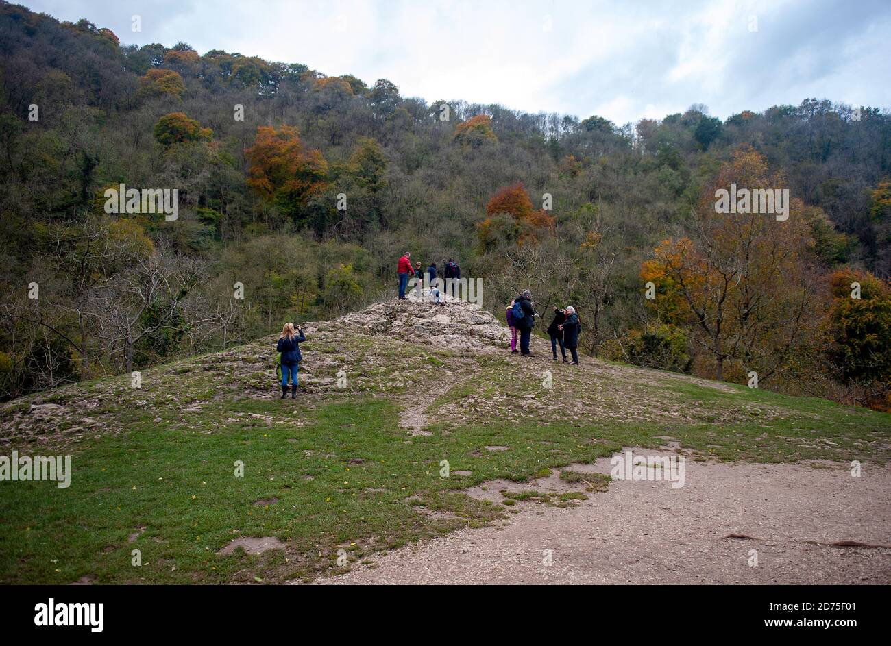 UK Weather: people enjoying the Autumnal countryside in Dovedale, Derbyshire. Stock Photo