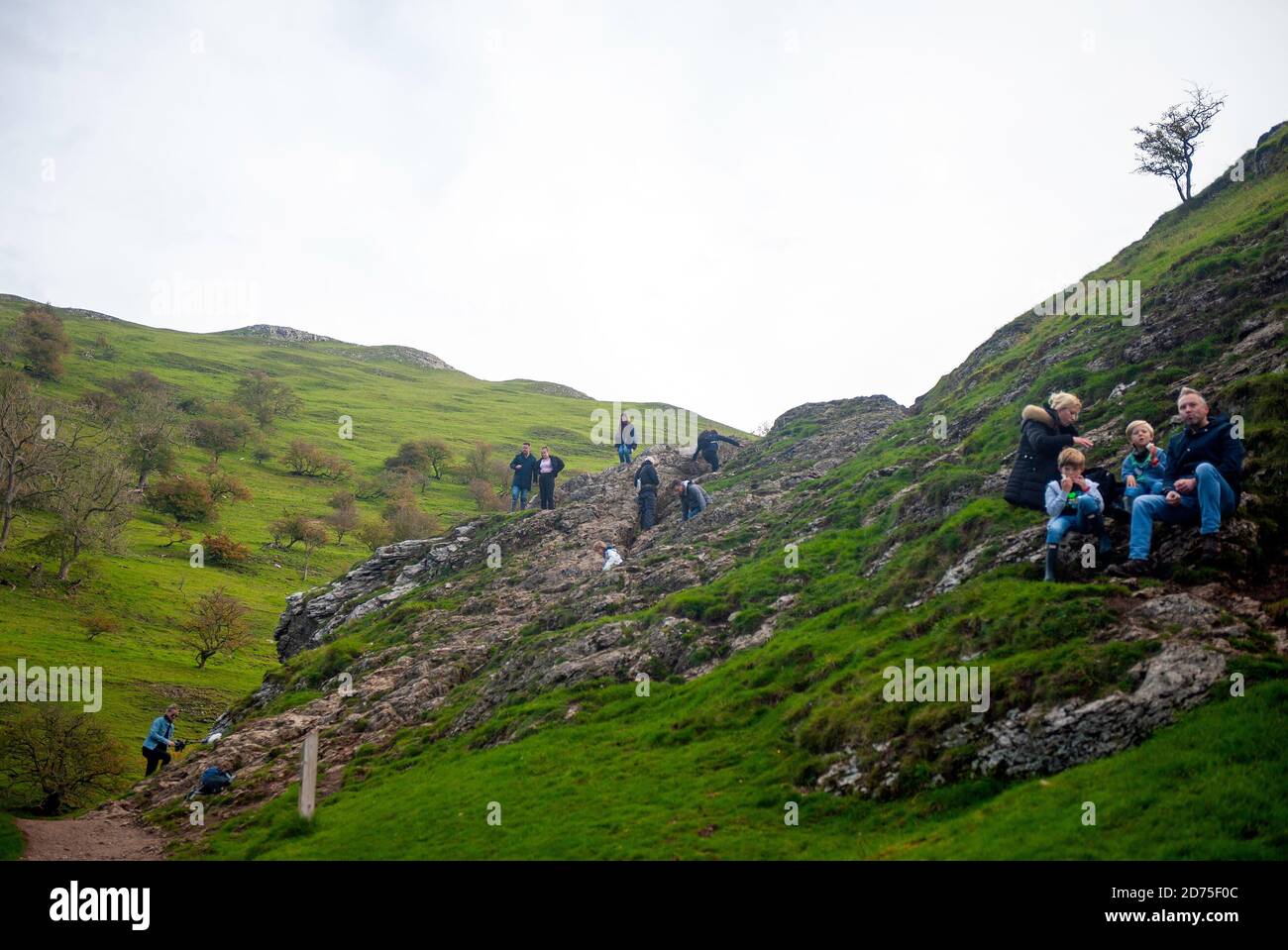UK Weather: people enjoying the Autumnal countryside in Dovedale, Derbyshire. Stock Photo