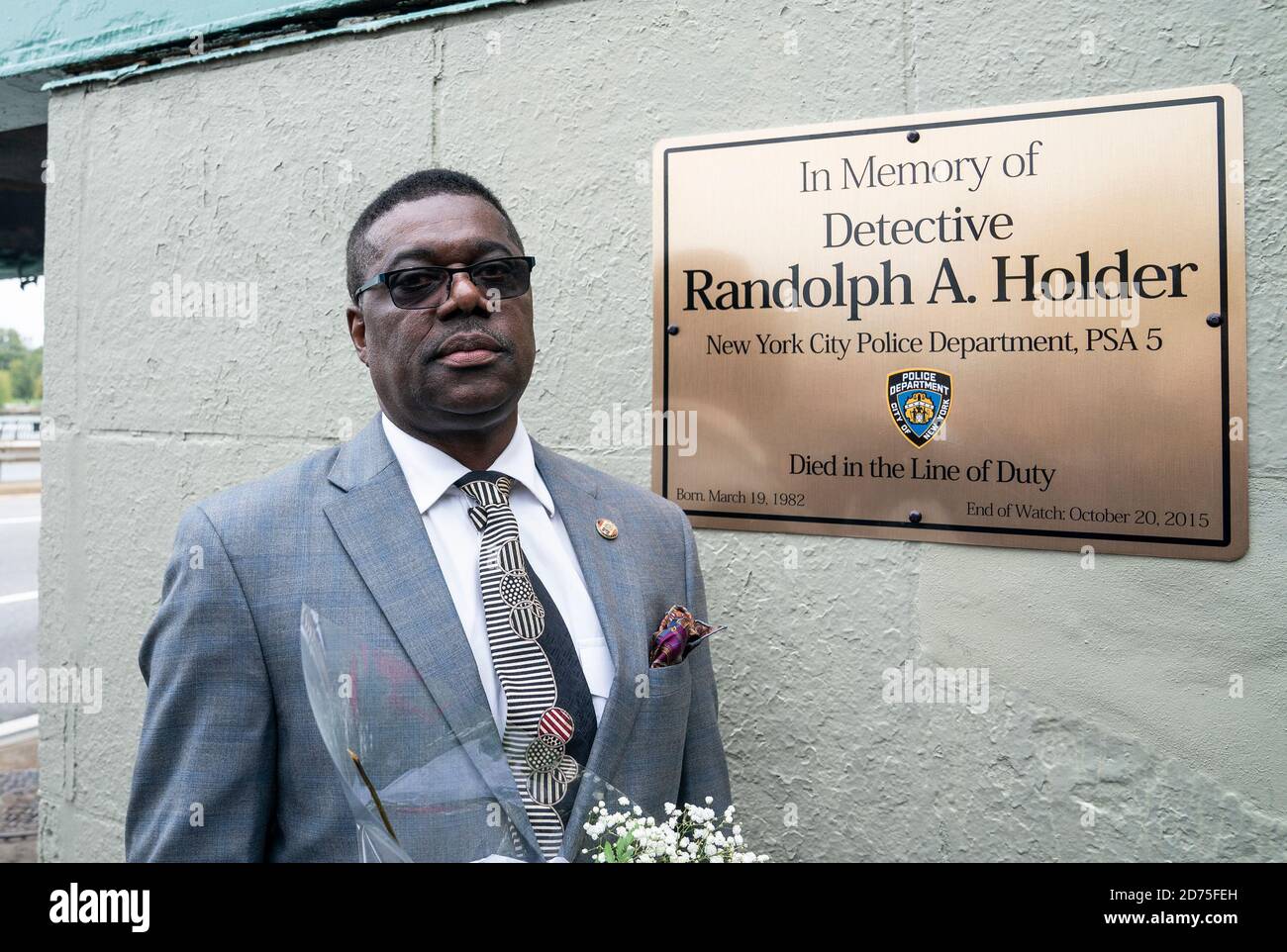 New York, United States. 20th Oct, 2020. Father of Randolph Holder attends bridge name dedication and plaque installation in memory of his son in Harlem, New York on October 20, 2020. Pedestrian footbridge over Franklin D. Roosevelt Drive at 120th Street where officer Holder was killed in 2015 connects Harlem streets and public bike and walkway along Harlem river. (Photo by Lev Radin/Sipa USA) Credit: Sipa USA/Alamy Live News Stock Photo