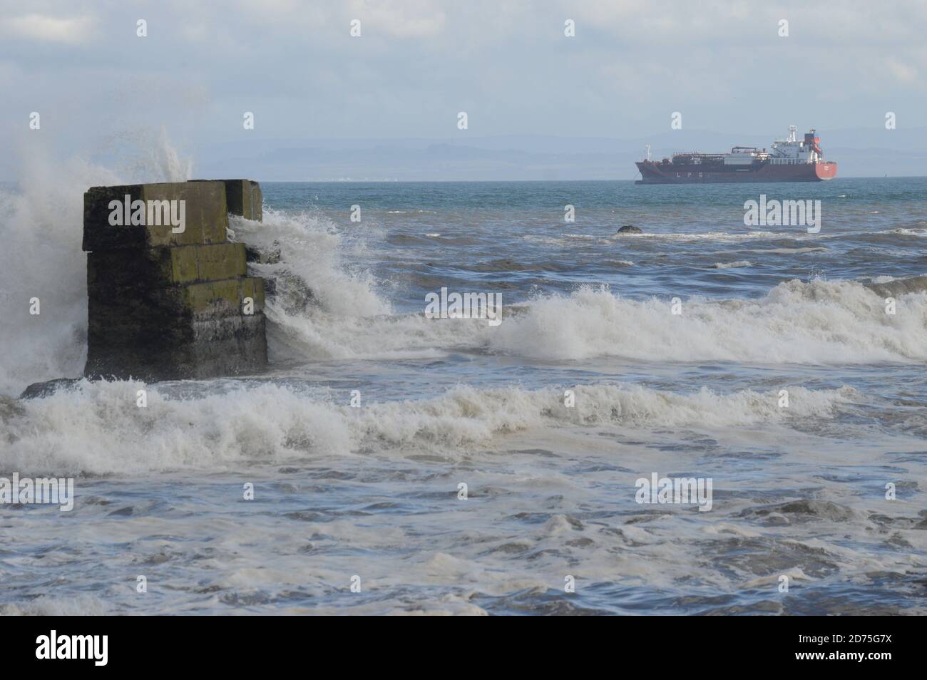 Rough seas at Kirkcaldy, Fife, with Liquid Petroleum Gas vessel in