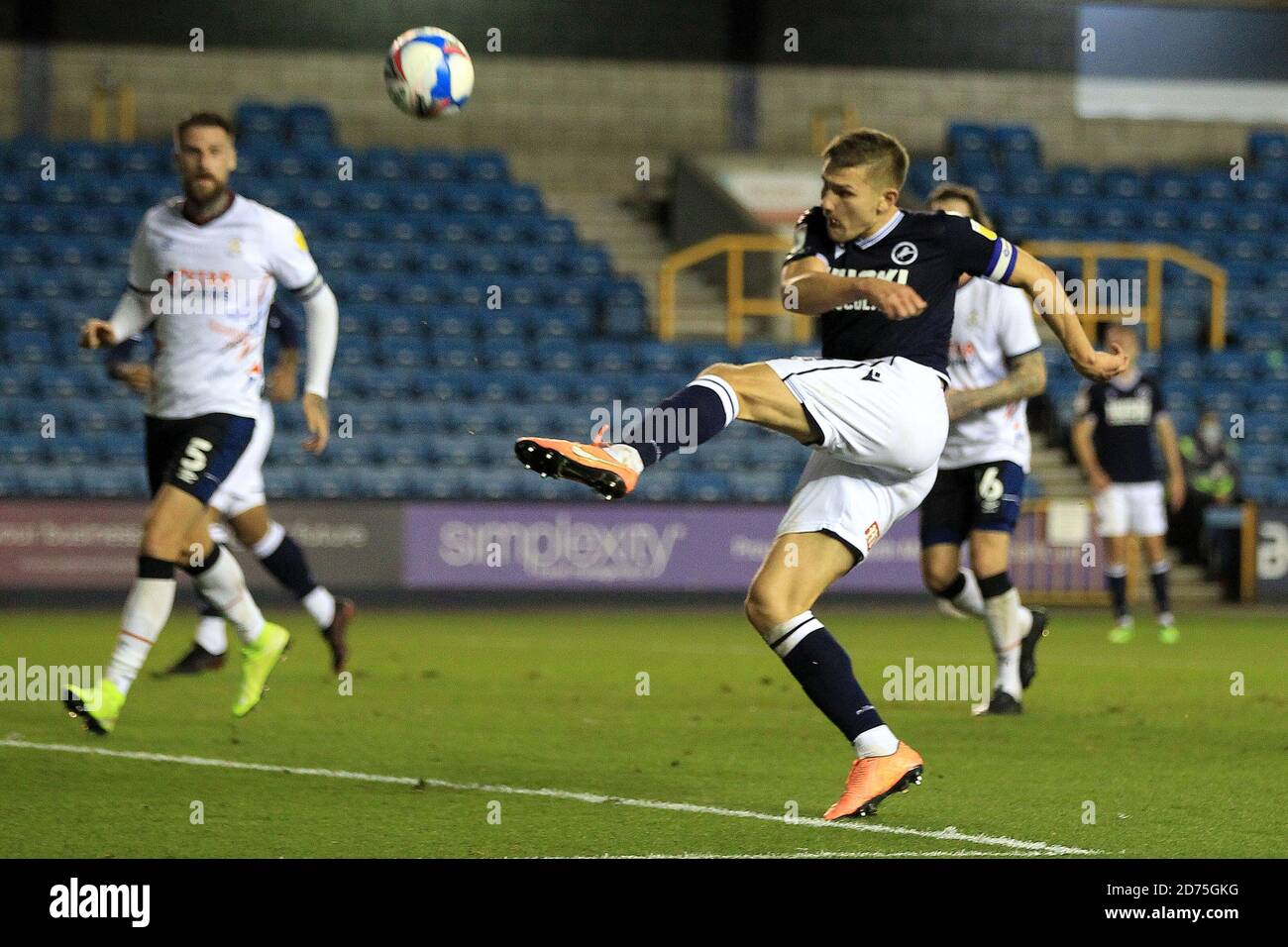London, UK. 20th Oct, 2020. Shaun Hutchinson of Millwall takes a shot at goal. EFL Skybet Championship match, Millwall v Luton Town at the Den in London on Tuesday 20th October 2020. this image may only be used for Editorial purposes. Editorial use only, license required for commercial use. No use in betting, games or a single club/league/player publications. pic by Steffan Bowen/Andrew Orchard sports photography/Alamy Live news Credit: Andrew Orchard sports photography/Alamy Live News Stock Photo