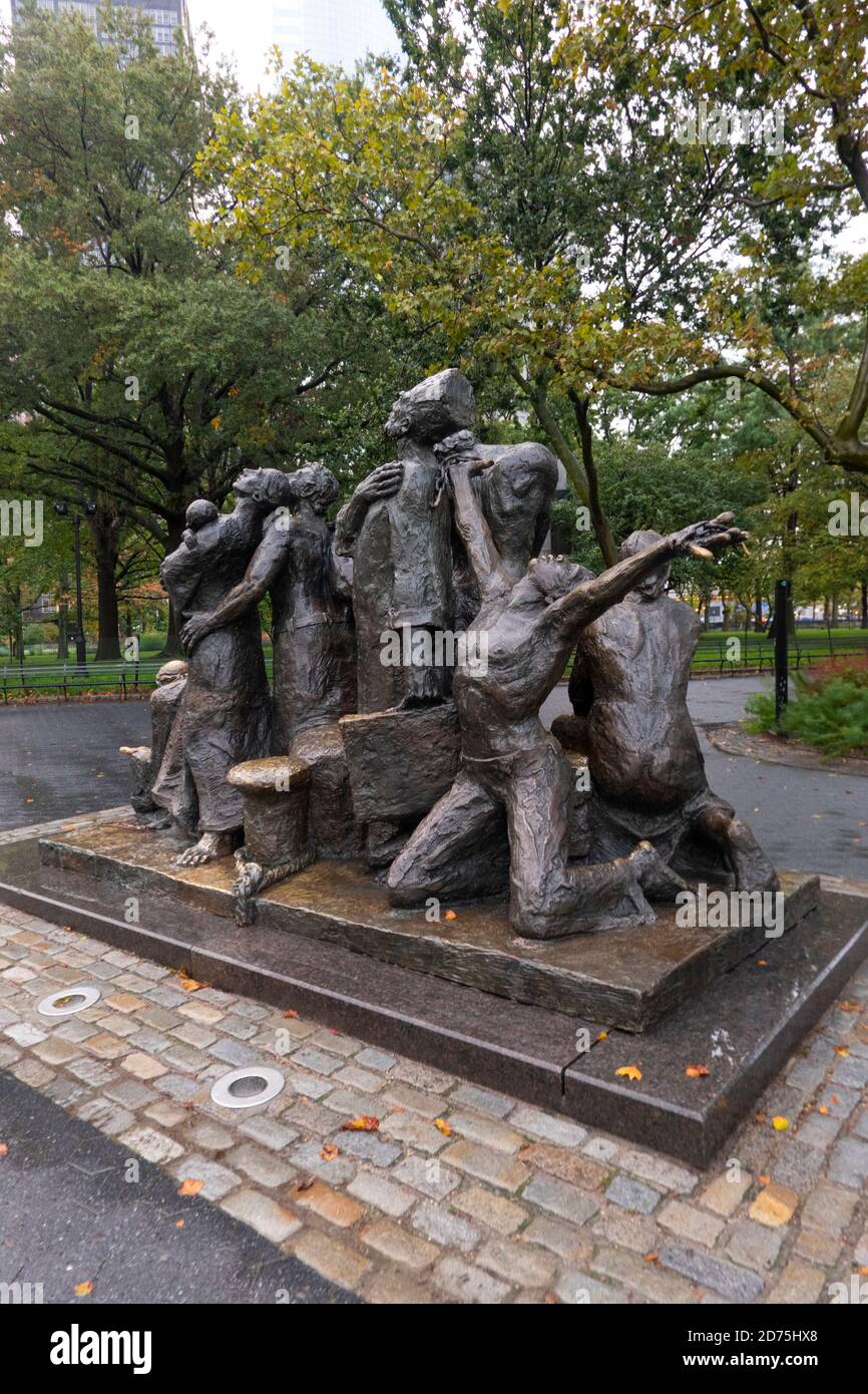 The Immigrants statue in Battery Park Manhattan NYC Stock Photo Alamy
