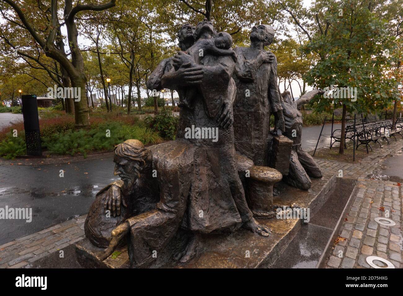The Immigrants statue in Battery Park Manhattan NYC Stock Photo Alamy