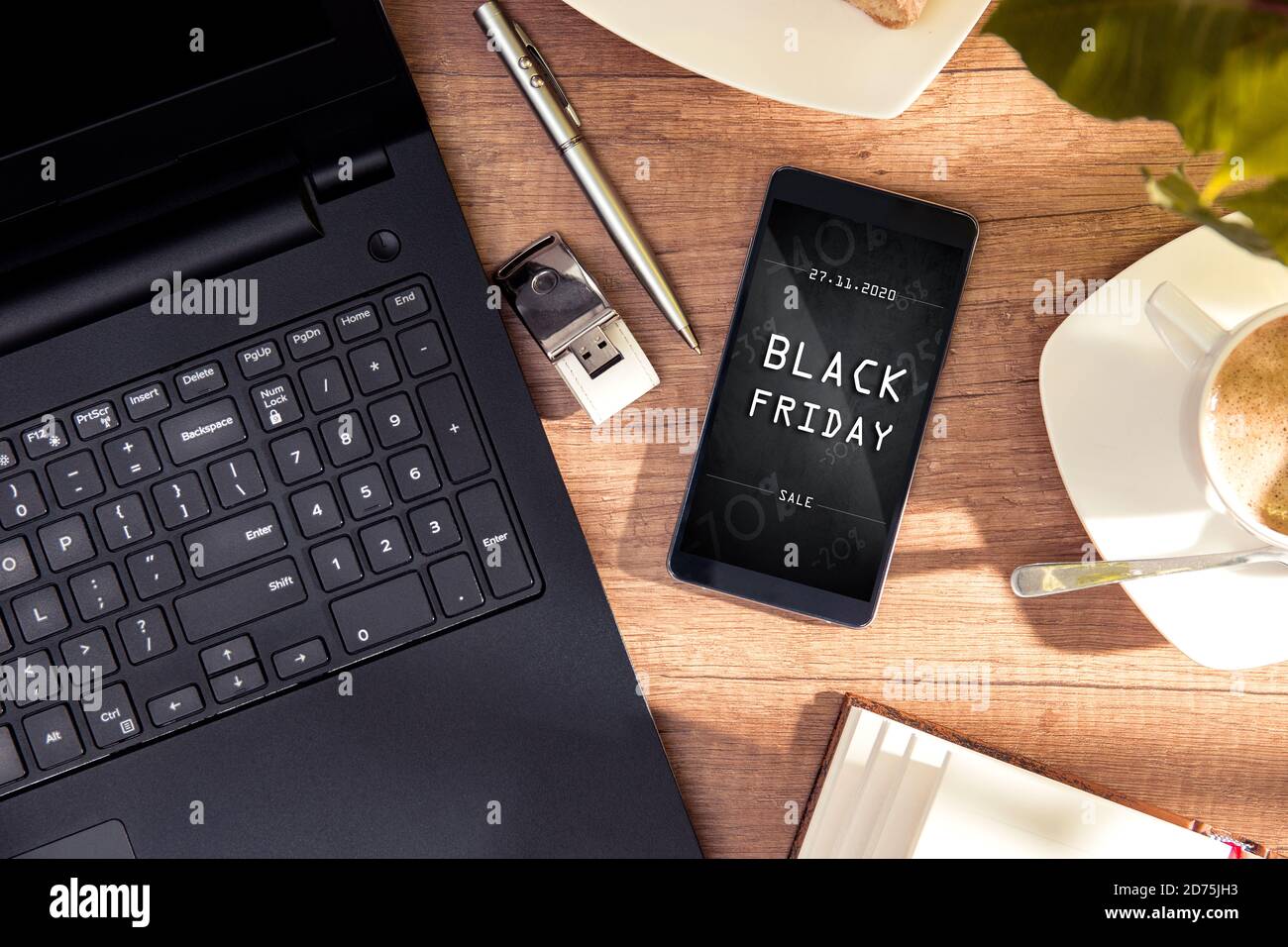 Smartphone with black friday banner on the screen. Conception incoming promotion in e-commerce Stock Photo