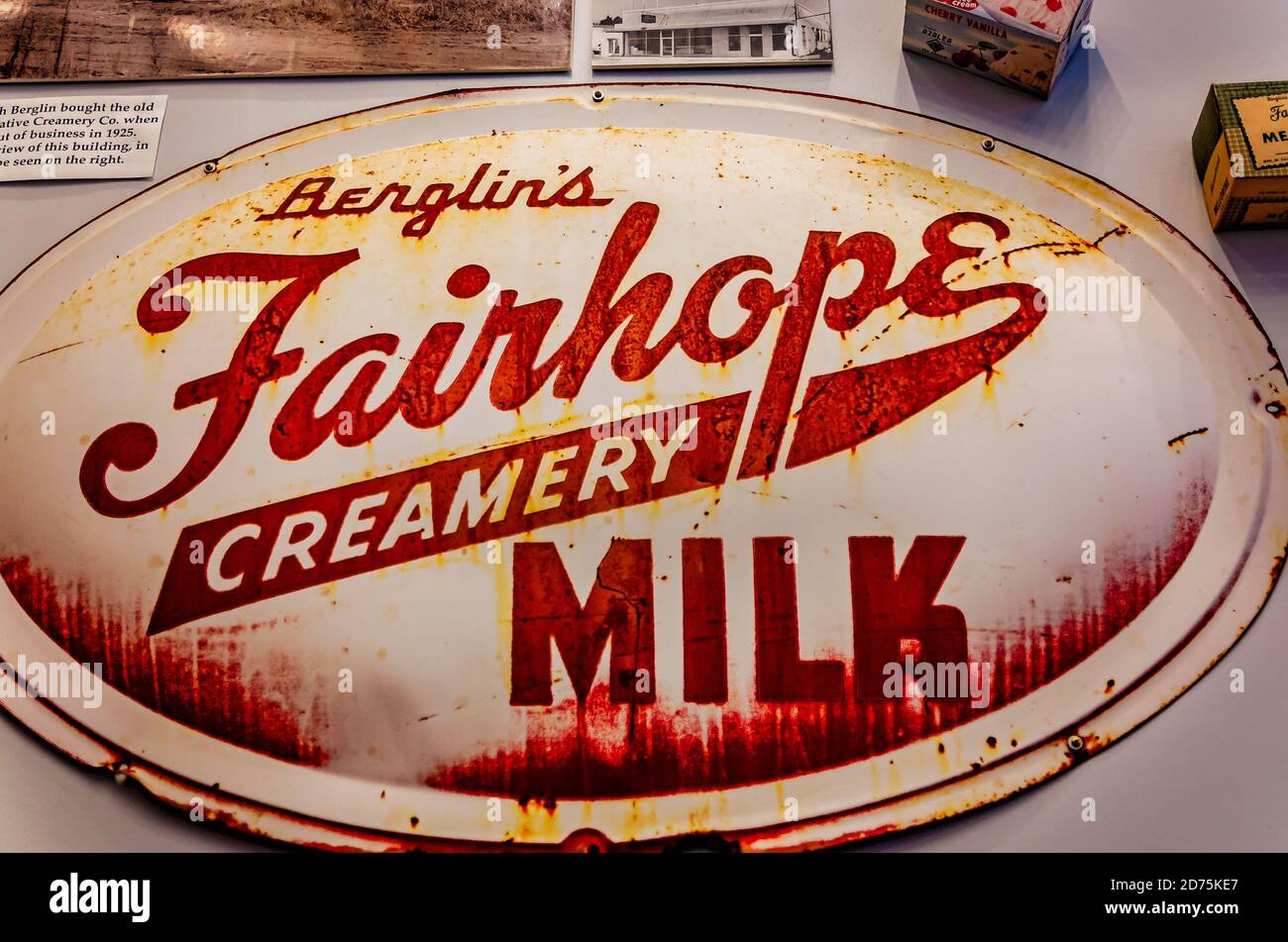 An old metal sign advertises Berglin’s Fairhope Creamery milk at Fairhope Museum of History, Oct. 17, 2020, in Fairhope, Alabama. Stock Photo