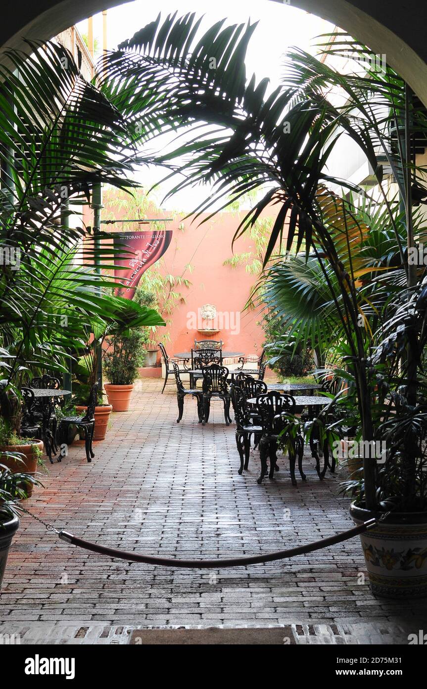 A view into the courtyard dining area of an Italian restaurant La Cucina di Ivo Cafe in Old San juan,Puerto Rico. Stock Photo