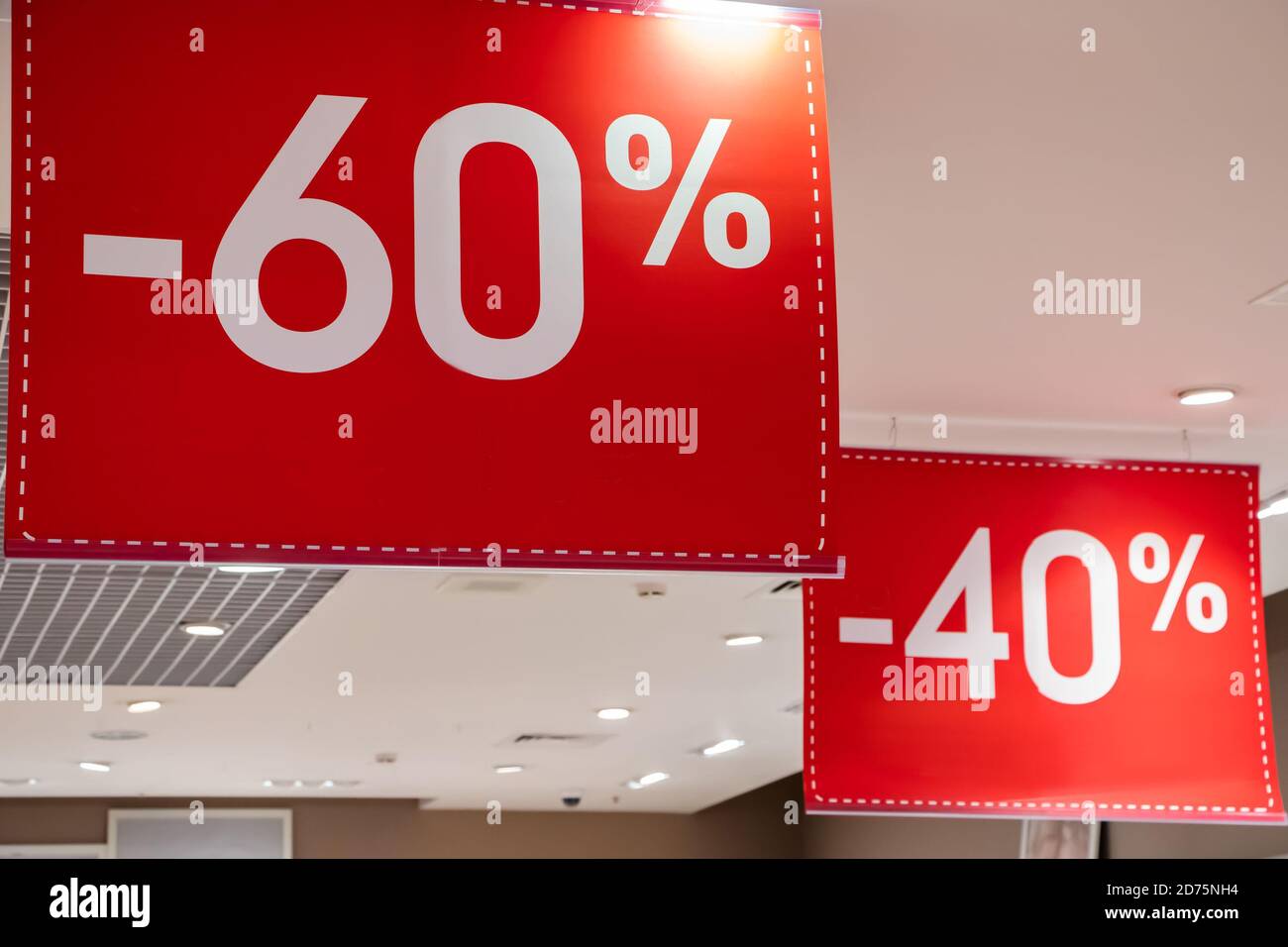 Discount banner for sale in a shopping center. Stock Photo