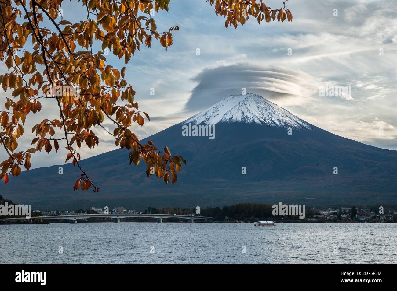 Mount Fuji on a fall day. Beautiful concentric clouds over its crater. Stock Photo