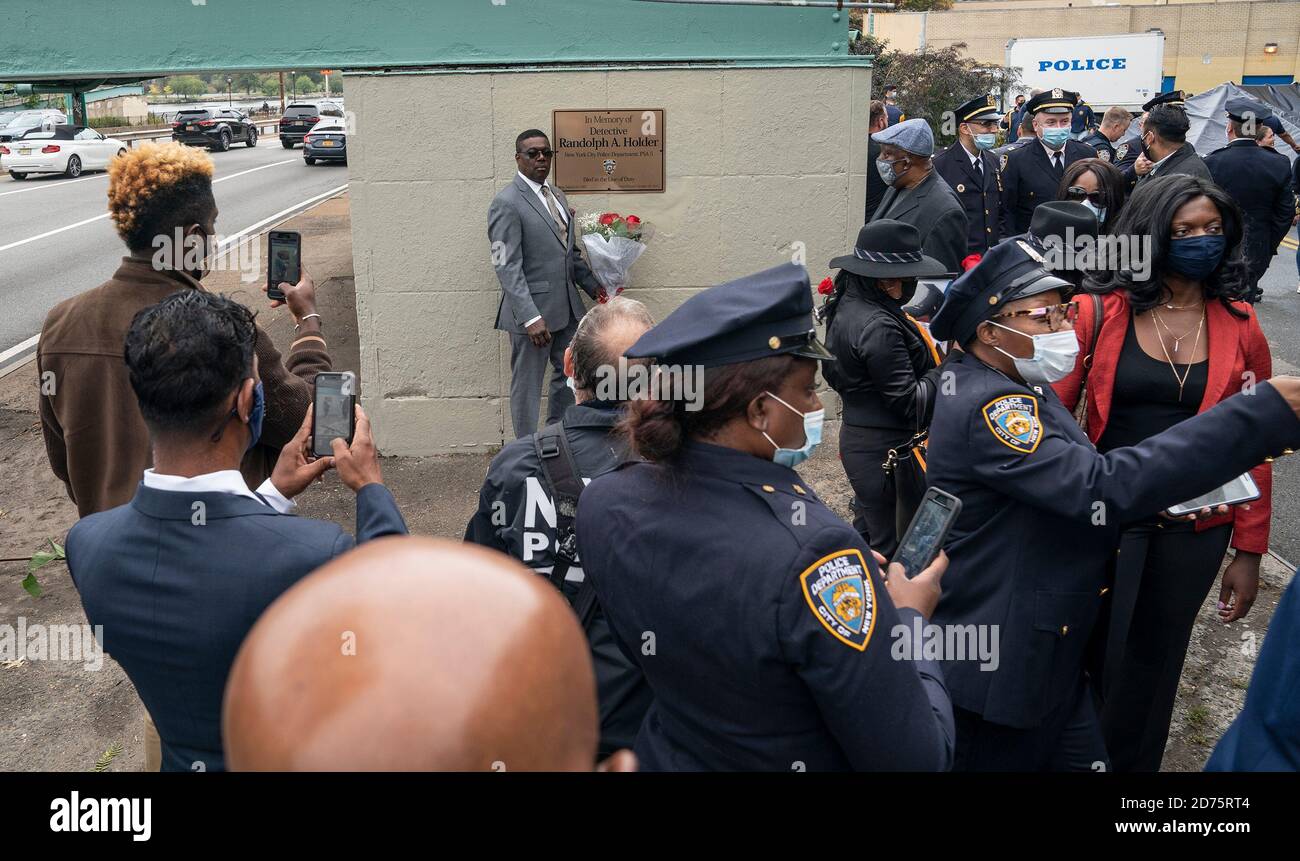 Father of Randolph Holder attends bridge name dedication and plaque installation in memory of his son in Harlem. Pedestrian footbridge over Franklin D. Roosevelt Drive at 120th Street where officer Holder was killed in 2015 connects Harlem streets and public bike and walkway along Harlem river. Randolph Holder was posthumously promoted from the rank of officer to the rank of Detective. Detective Randolph Holder was shot and killed while pursuing an armed male subject. (Photo by Lev Radin/Pacific Press) Stock Photo