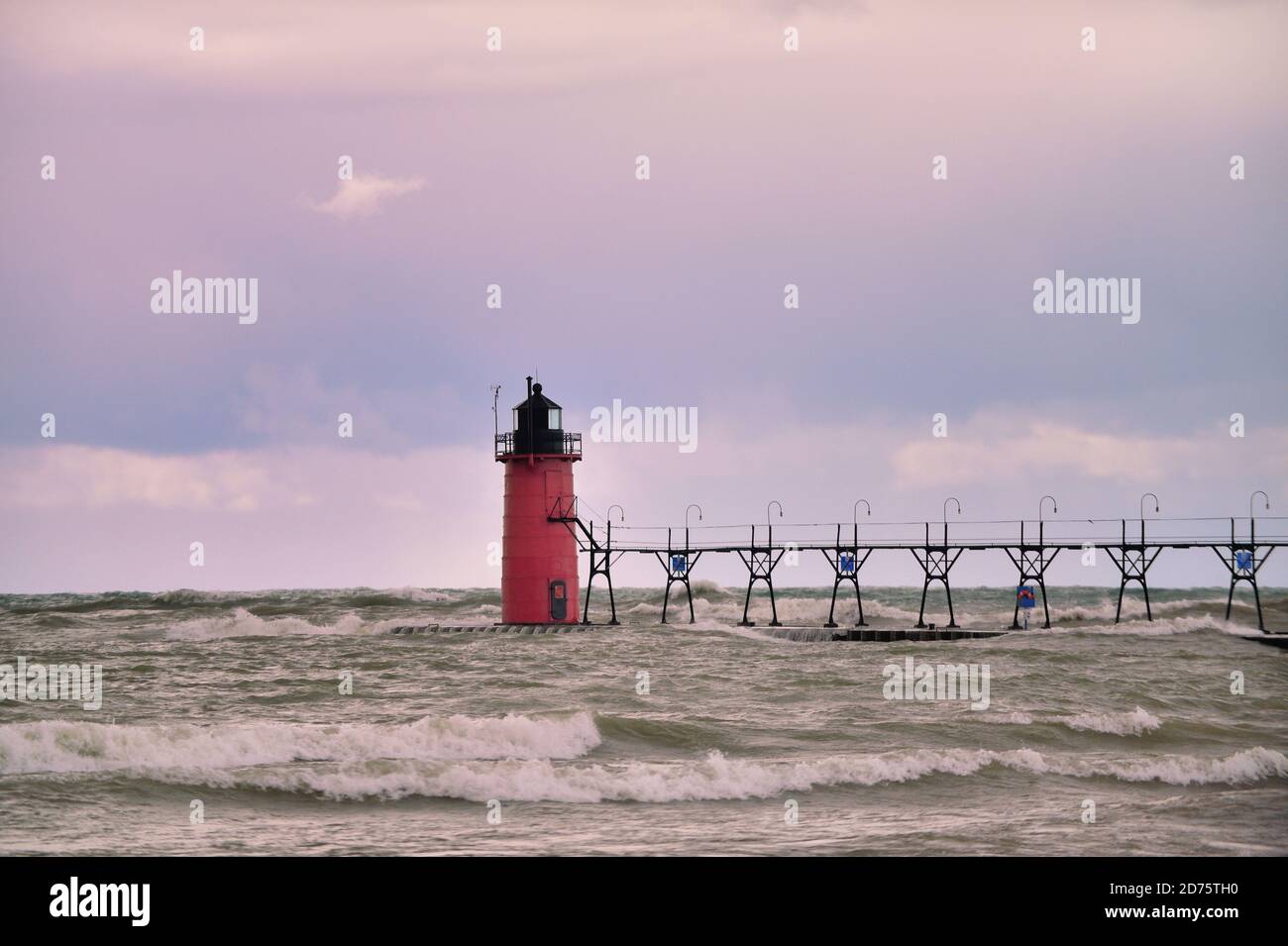 South Haven, Michigan, USA. The South Haven South Pierhead Light is an active lighthouse on Lake Michigan at the entrance of the Black River. Stock Photo