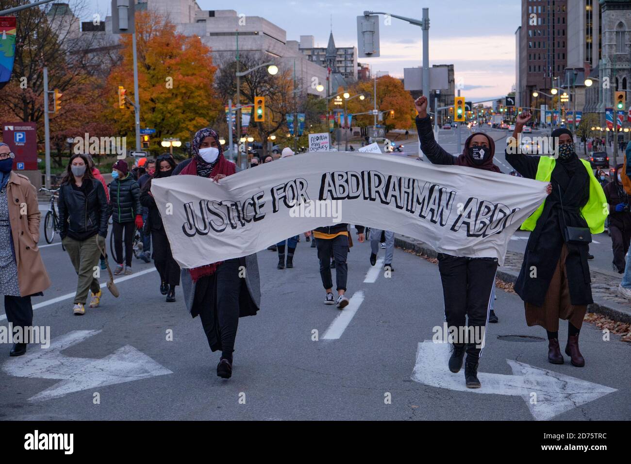 Ottawa, Canada. October 20th, 2020. About 500 people took to the street demanding justice for Abdirahman Abdi, who was killed during his arrest in 2016. Earlier today, the court found the arresting officer Ottawa police Const. Daniel Montsion not guilty on all charges related to the death. This is another case in the ongoing community battle between the police and black members of the community. Abdi had come to Canada from Somalia in 2009 and at the time of his death was 37. Credit: meanderingemu/Alamy Live News Stock Photo