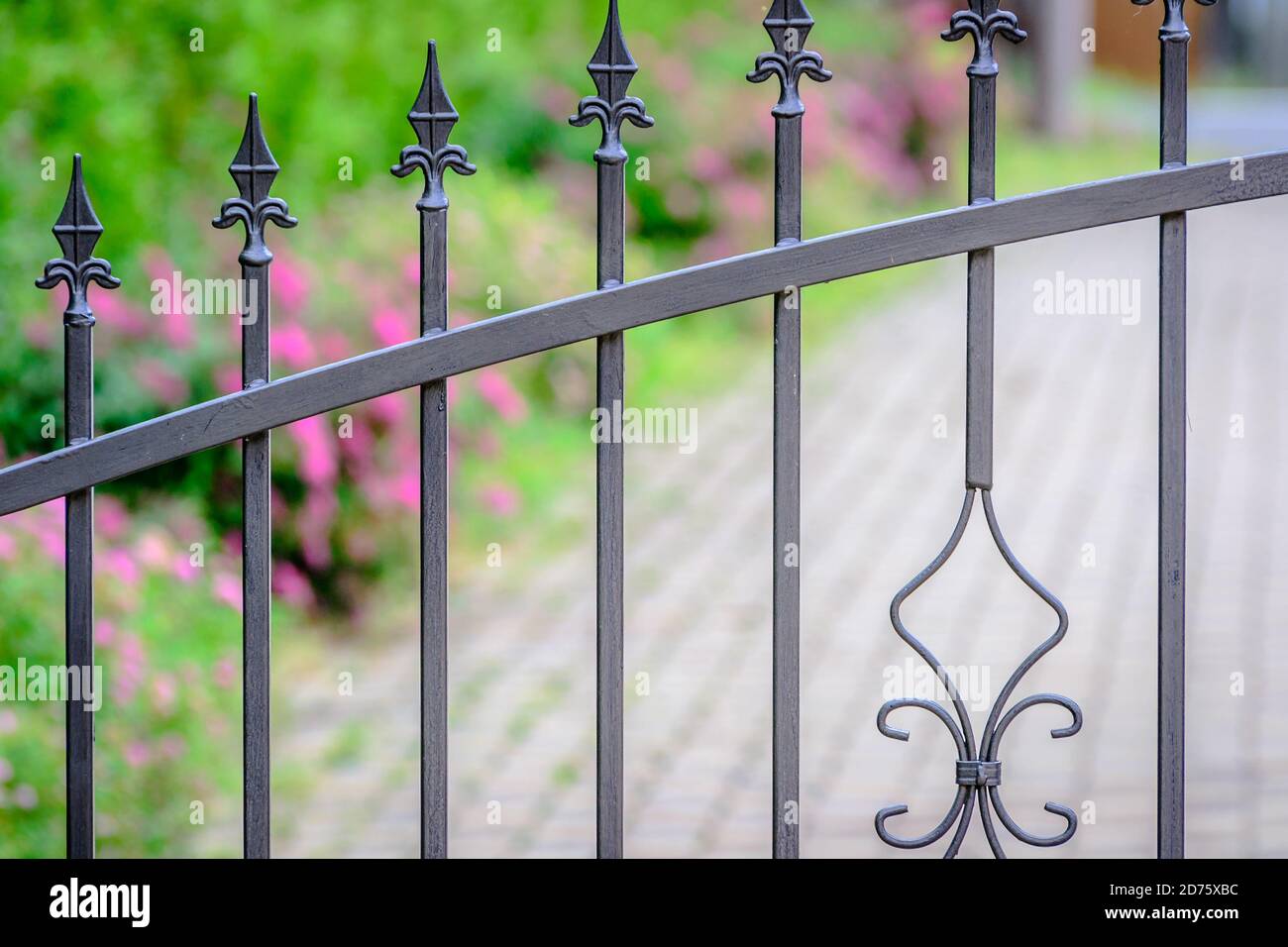 Grey painted metal fence Stock Photo Alamy