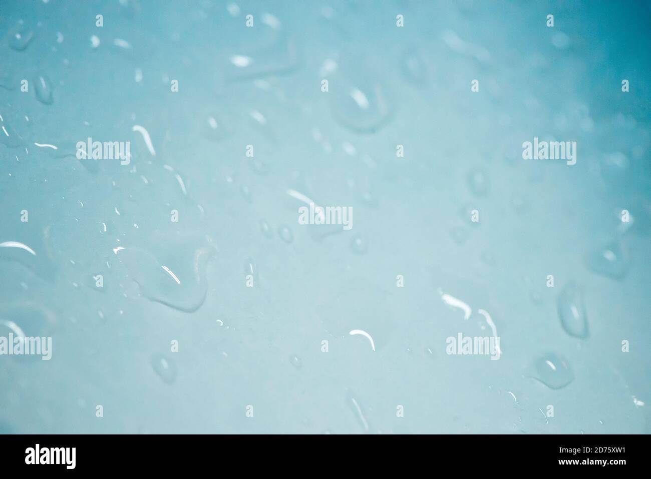 Blue water drops abstract background Stock Photo - Alamy