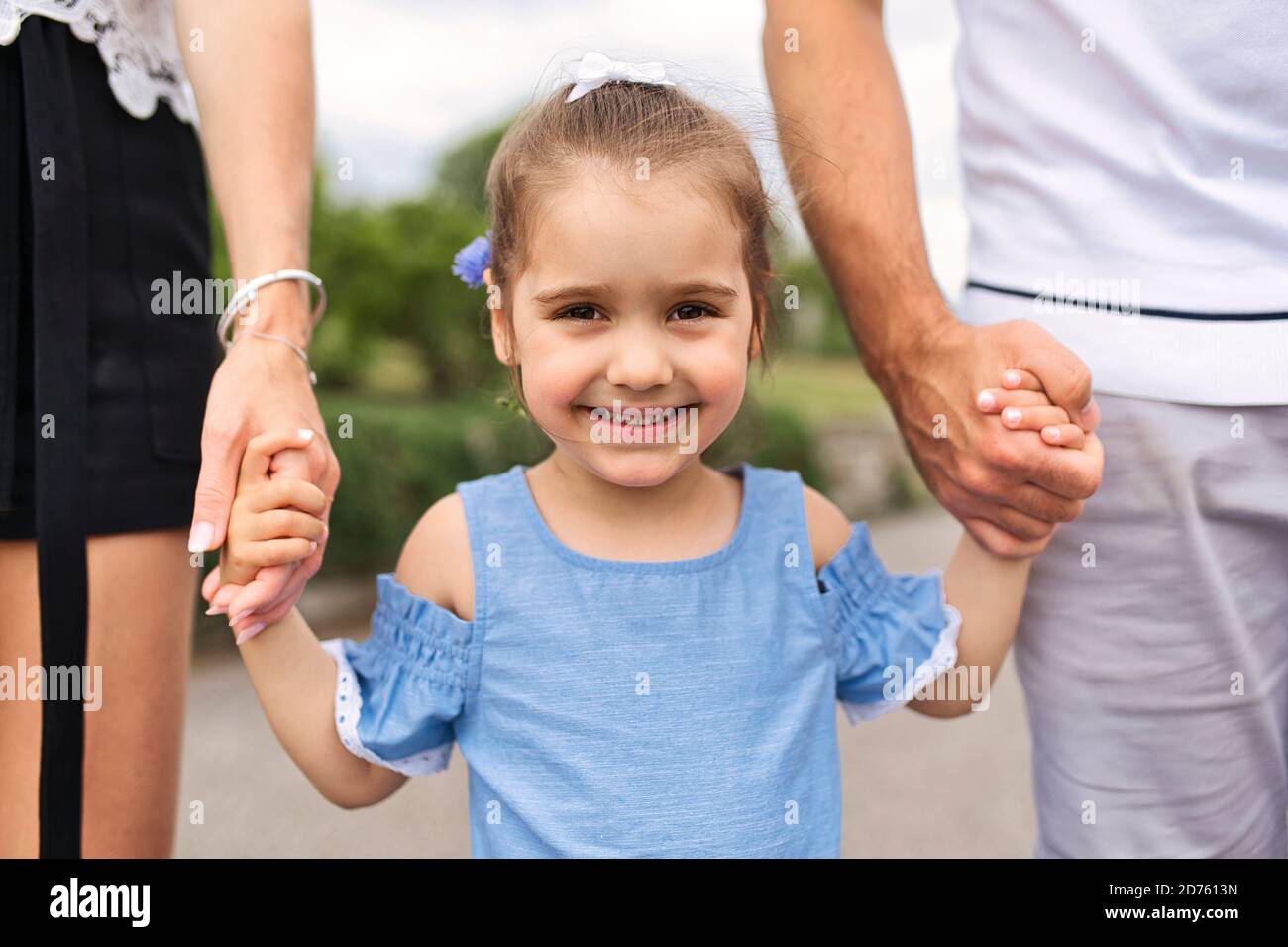 cute Portrait of a nice little girl outside Stock Photo - Alamy