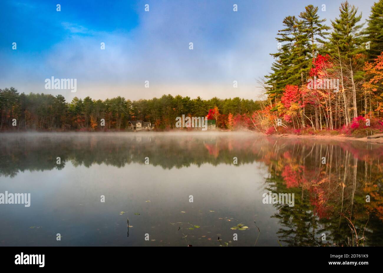 Colorful lake reflection on a misty autumn morning Stock Photo - Alamy