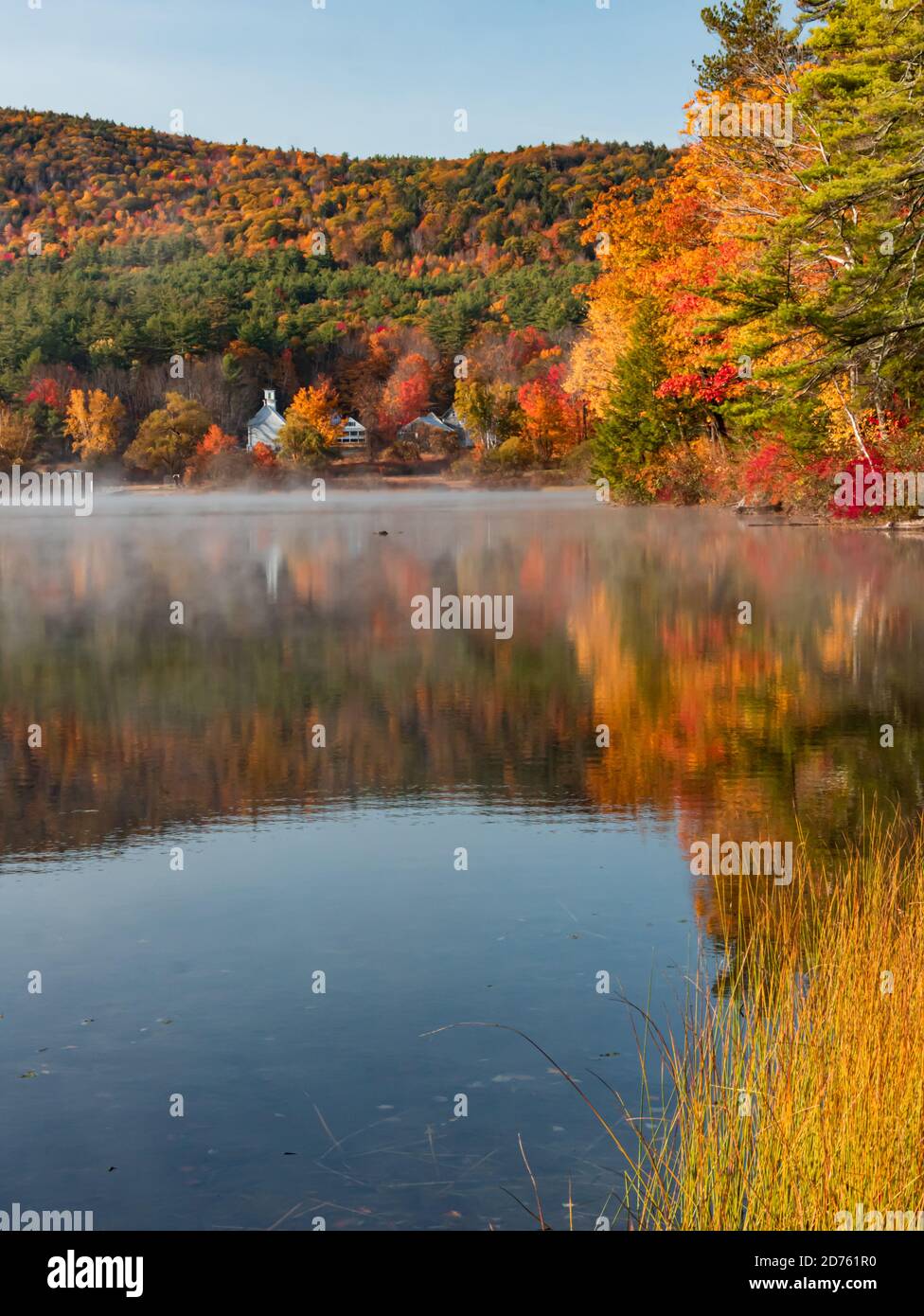 Colorful lake reflection on a misty autumn morning Stock Photo - Alamy