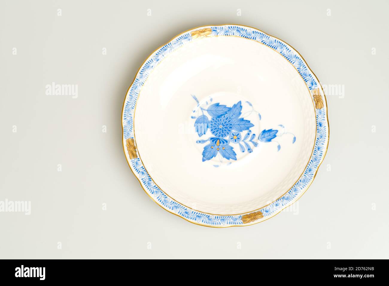 Saucer on light background. Herend Porcelain Hungary Manufacture Stock Photo