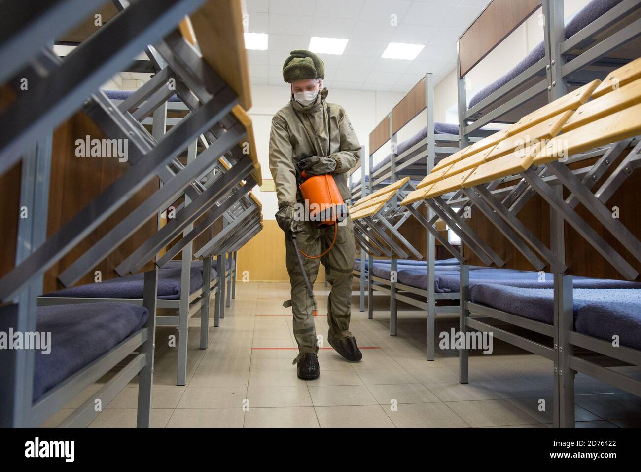 St. Petersburg, Russia. 20th Oct, 2020. A staff member disinfects an army recruitment center in St. Petersburg, Russia, Oct. 20, 2020. Russia's ongoing autumn army recruitment started on Oct. 1 and will last until Dec. 31. In order to be conscripted, candidates must be Russian citizens aged between 18 and 27, and pass a physical examination. Credit: Irina Motina/Xinhua/Alamy Live News Stock Photo