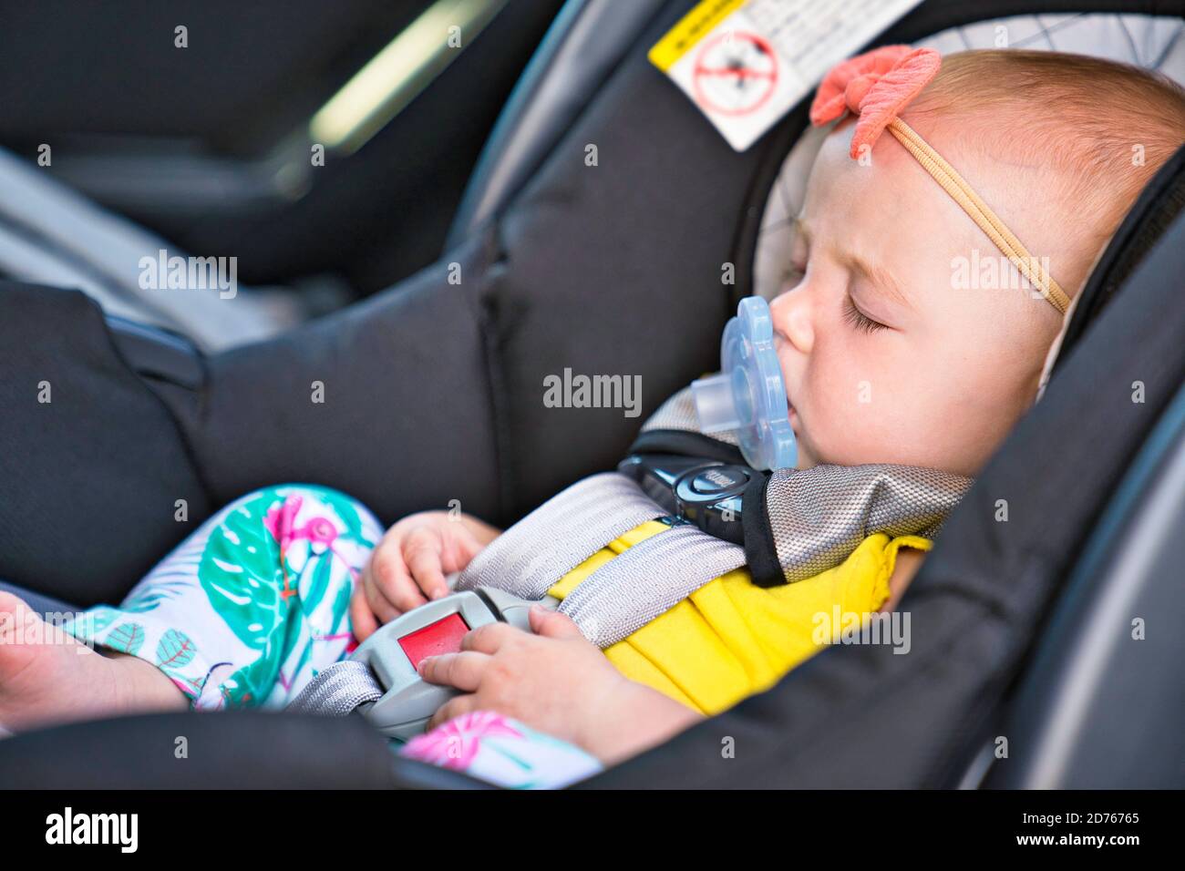 Baby sleeping car seat hires stock photography and images Alamy