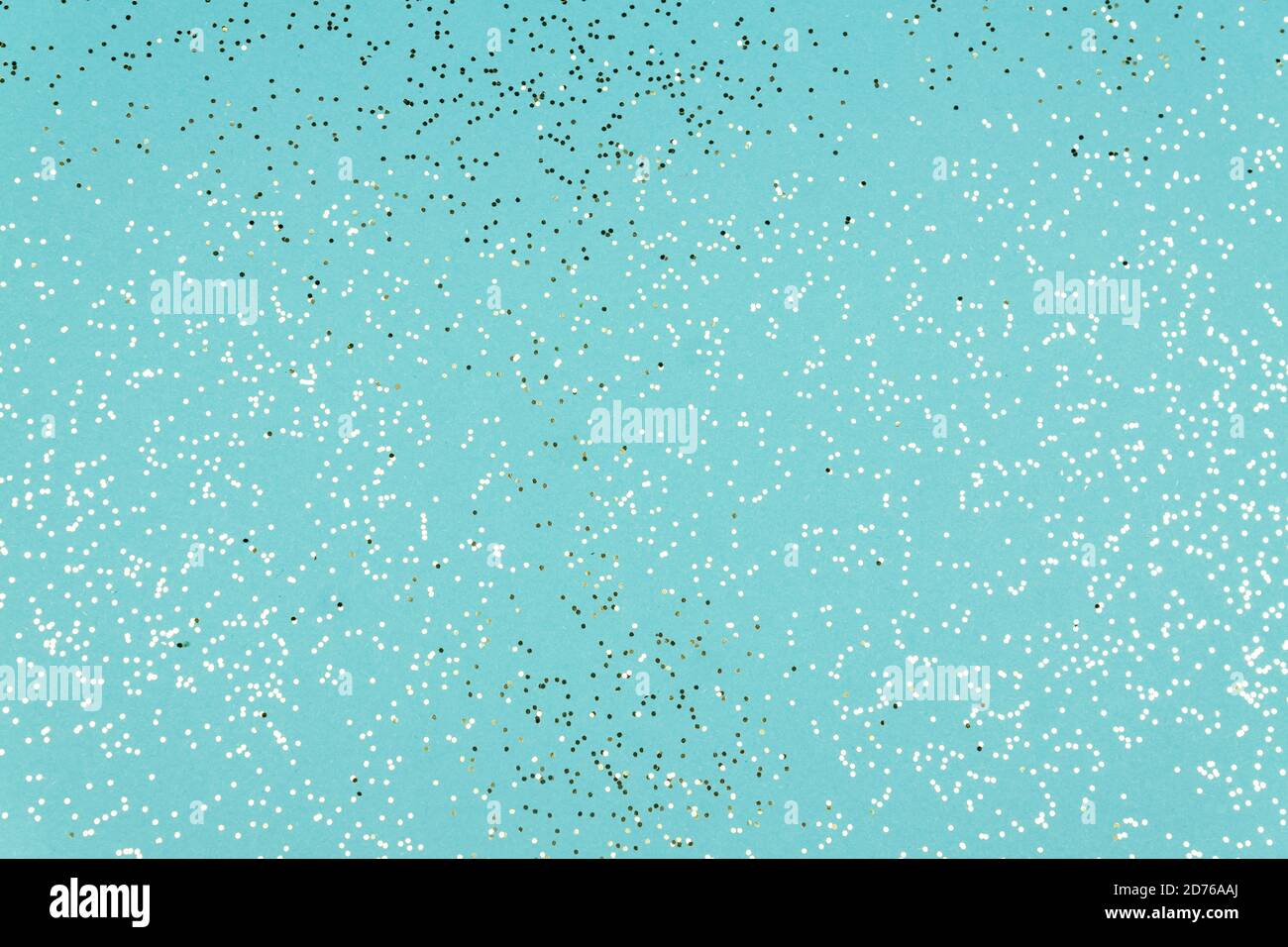 Blue Festive background texture with glittering silver confetti. Stock Photo