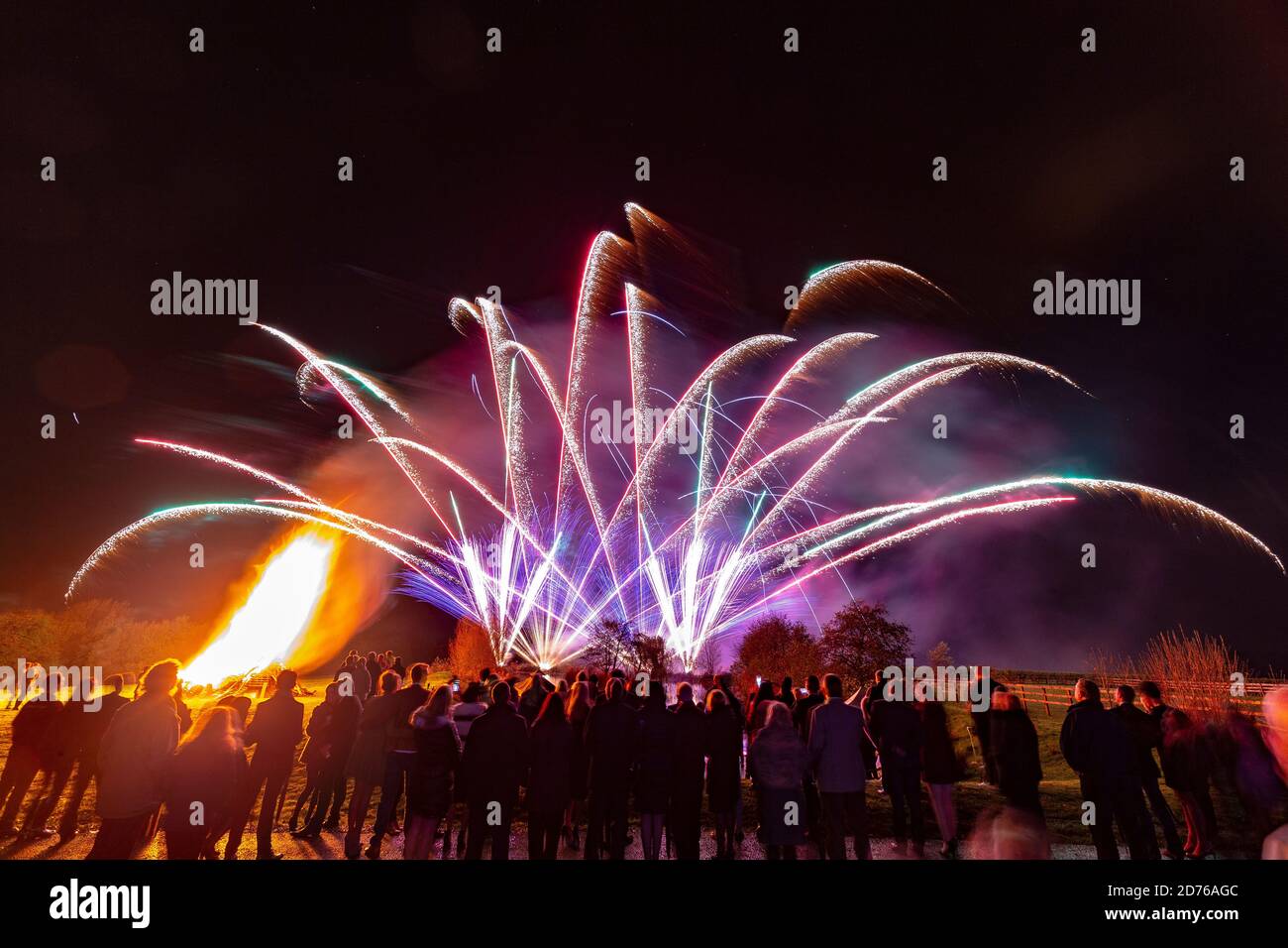 Spectacular and colourful firework display set against a dark Autumn