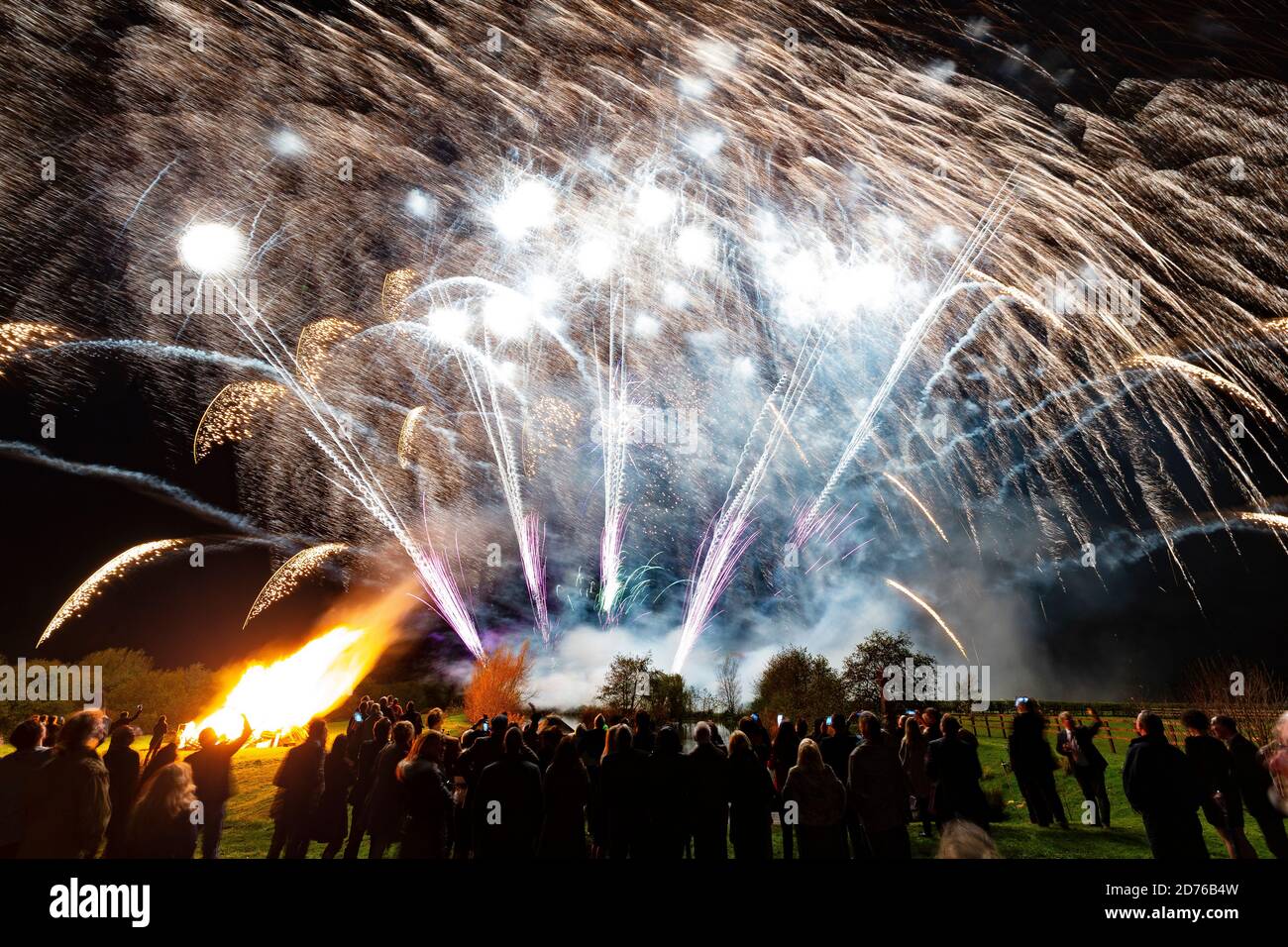 Spectacular and colourful firework display set against a dark Autumn