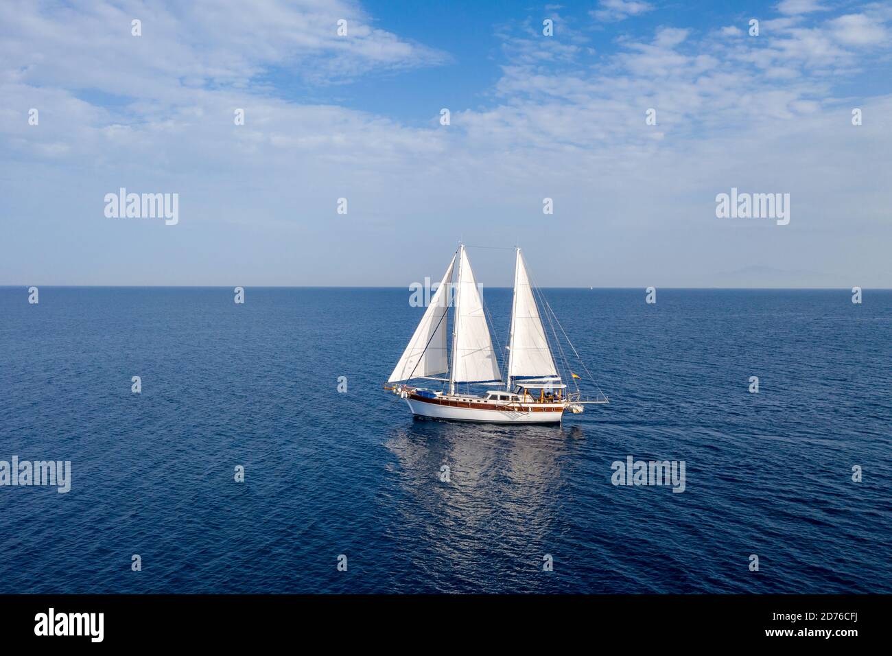 Download Sailing Ship Yacht Luxury Boat With White Sails In The Open Sea Wooden Vintage Sailboat Cloudy Blue Sky Background Aegean Sea Greece Stock Photo Alamy