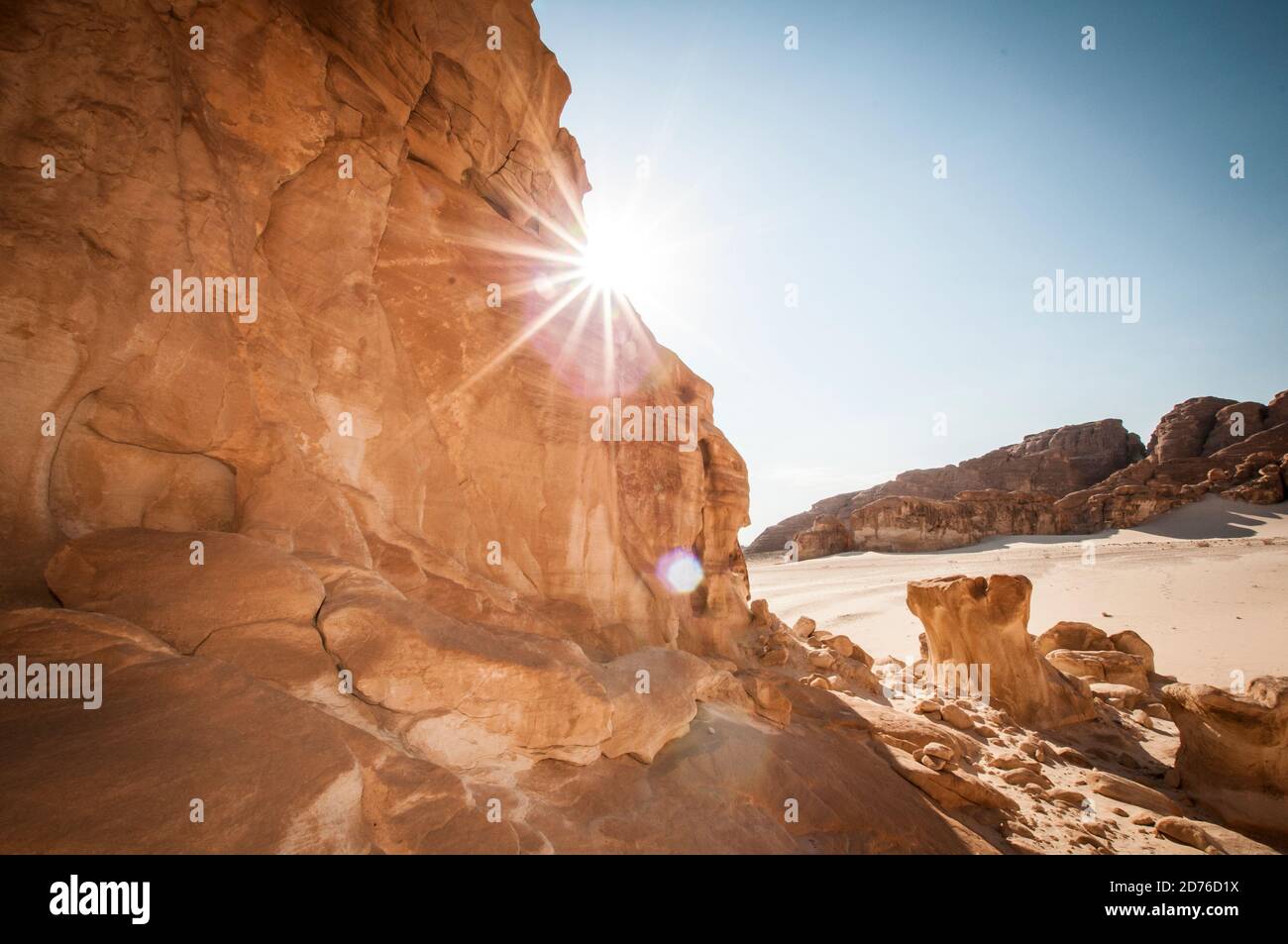 Desert landscape with blue sky and sun with sand and mountains Stock ...