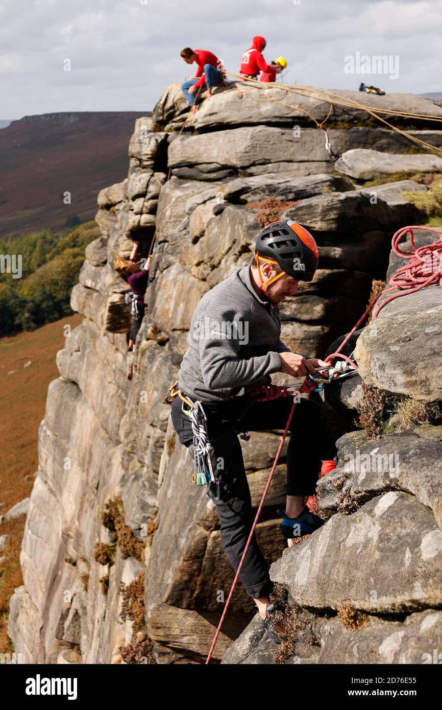 Rock climbing in Derbyshire Peak District England UK Stock Photo
