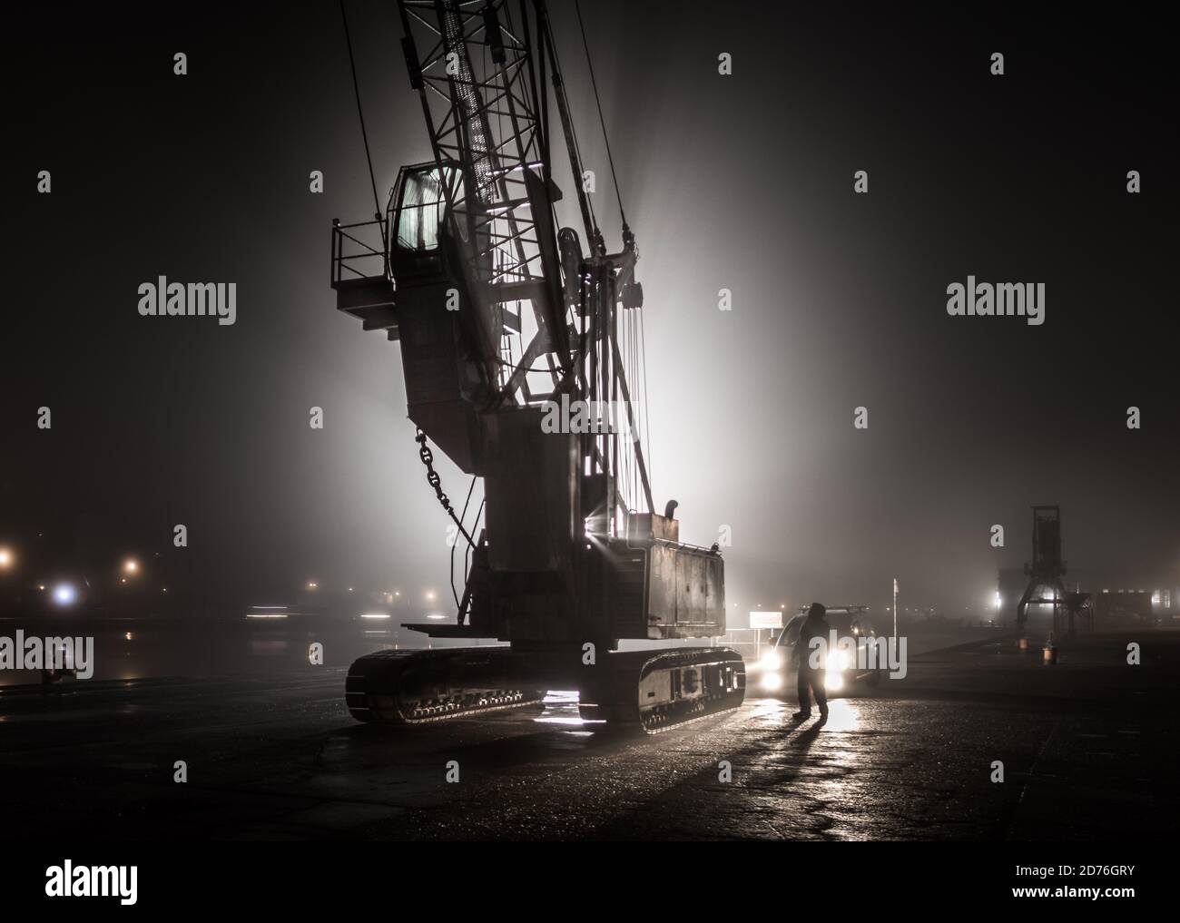 Cork City, Cork, Ireland. 21st October, 2020. Steven McCarthy of Doyle Shipping checks his crane before starting work on a foggy morning at the docks on Kennedy Quay in Cork City, Cork, Ireland. - Credit; David Creedon / Alamy Live News Stock Photo