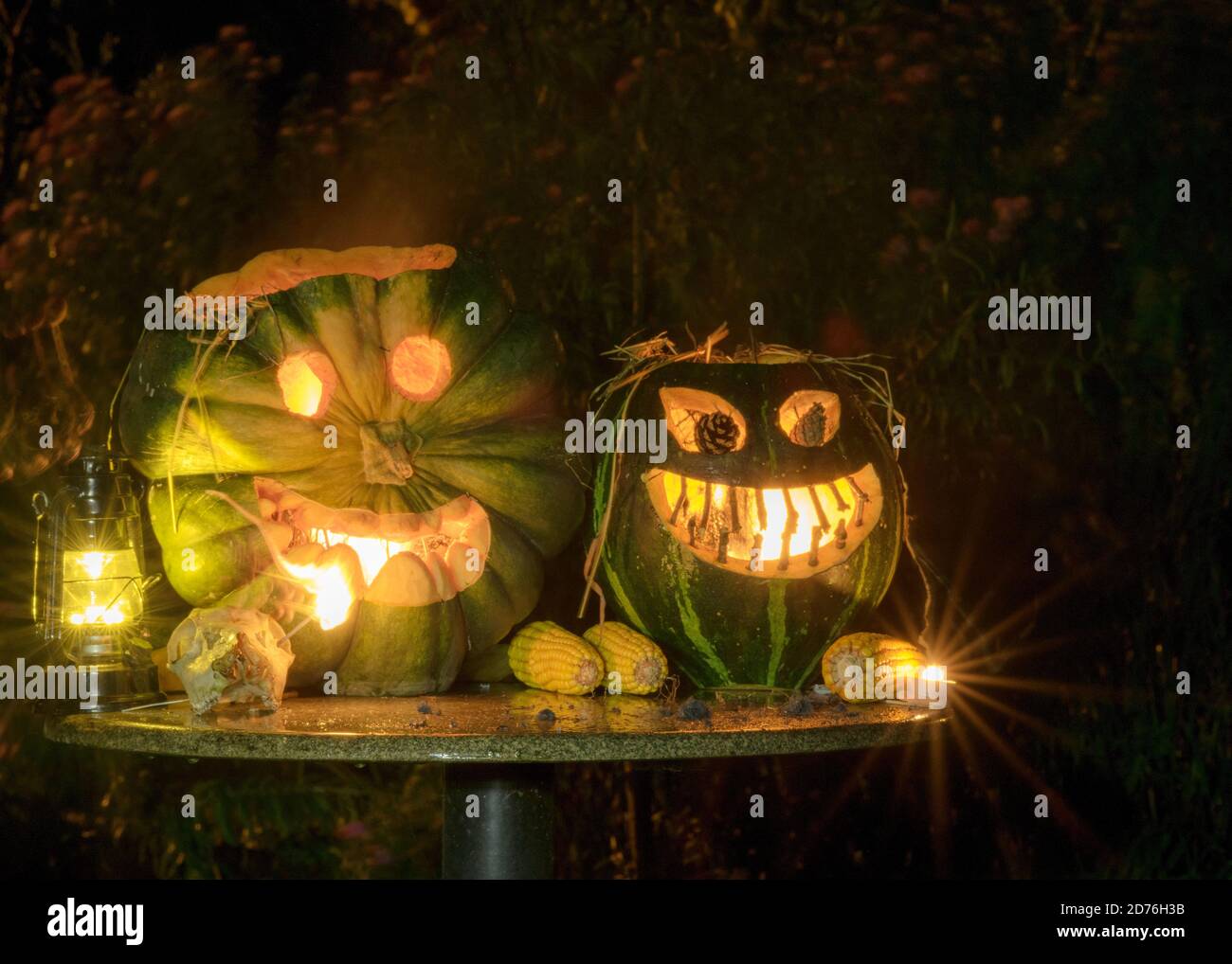 Halloween pumpkin head jack lantern with burning candles in a scary ...