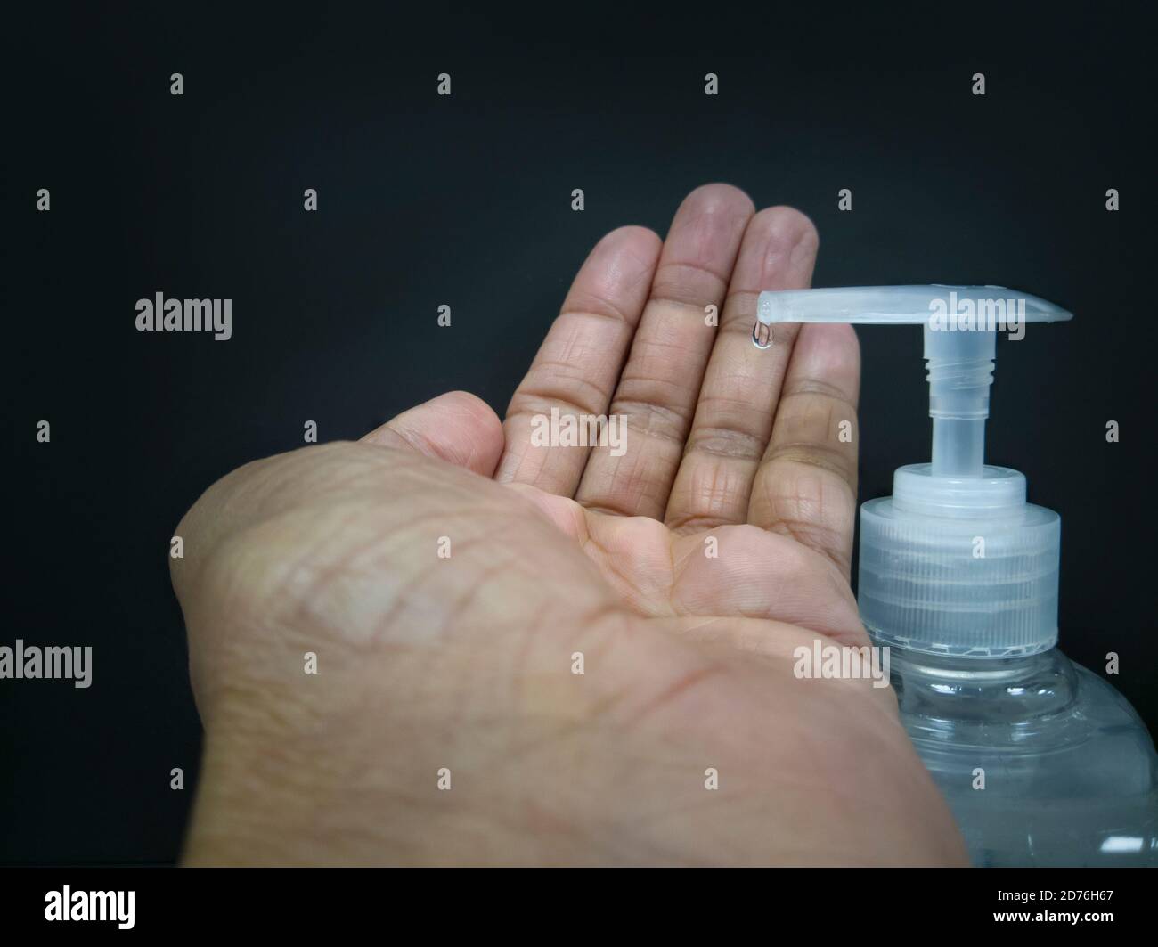 Washing hand with Antibacterial hand sanitizer, disinfection gel. Selective Focus Stock Photo