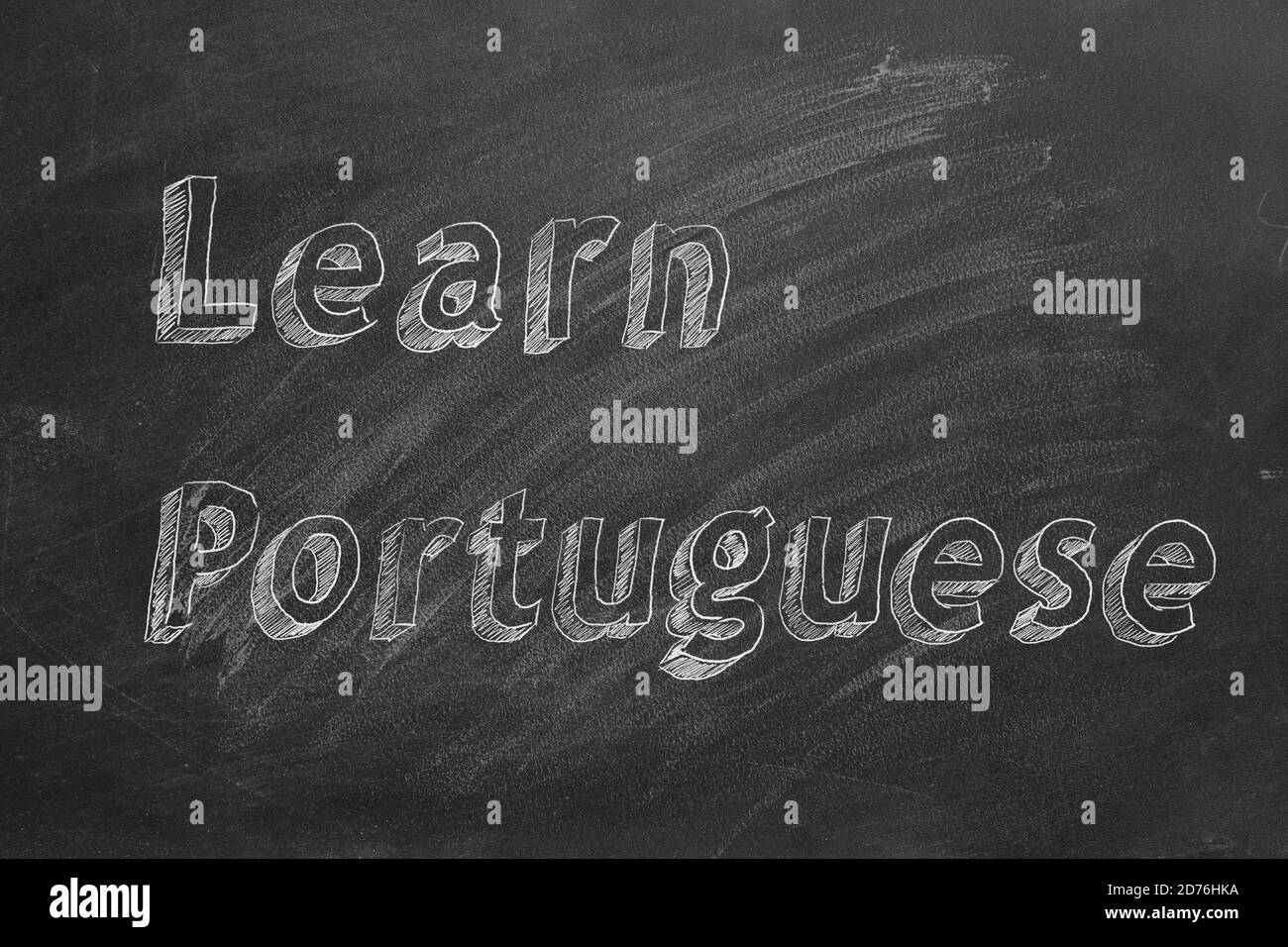 Hand drawing 'Learn Portuguese' on blackboard Stock Photo