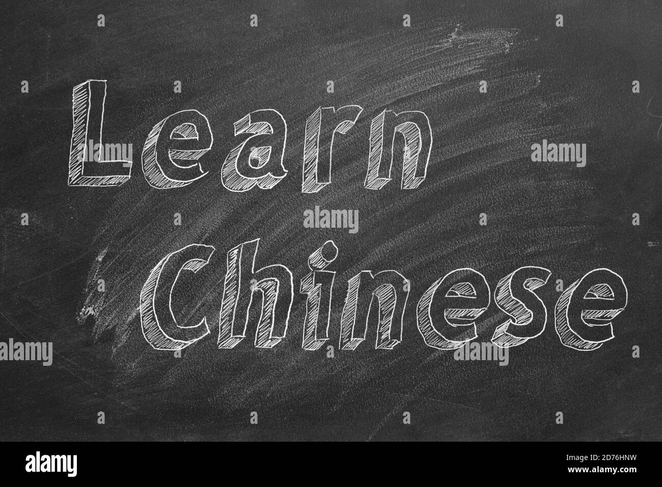Hand drawing 'Learn Chinese' on blackboard Stock Photo