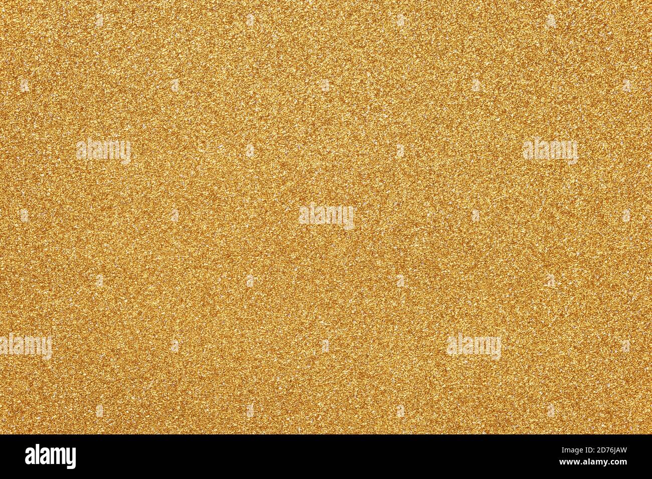 Gold sparkle texture, Christmas paper background. Glitter surface. Abstract grain pattern. Festive decoration. Shiny fabric with sequins. Holiday art Stock Photo