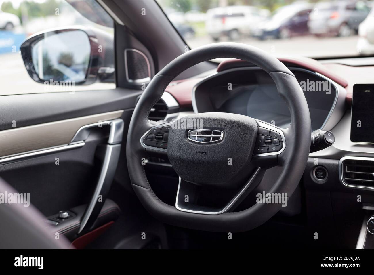 Russia, Izhevsk - August 14, 2020: Geely showroom. Steering wheel and interior of new modern CoolRay car. Car manufacturer from China. Stock Photo