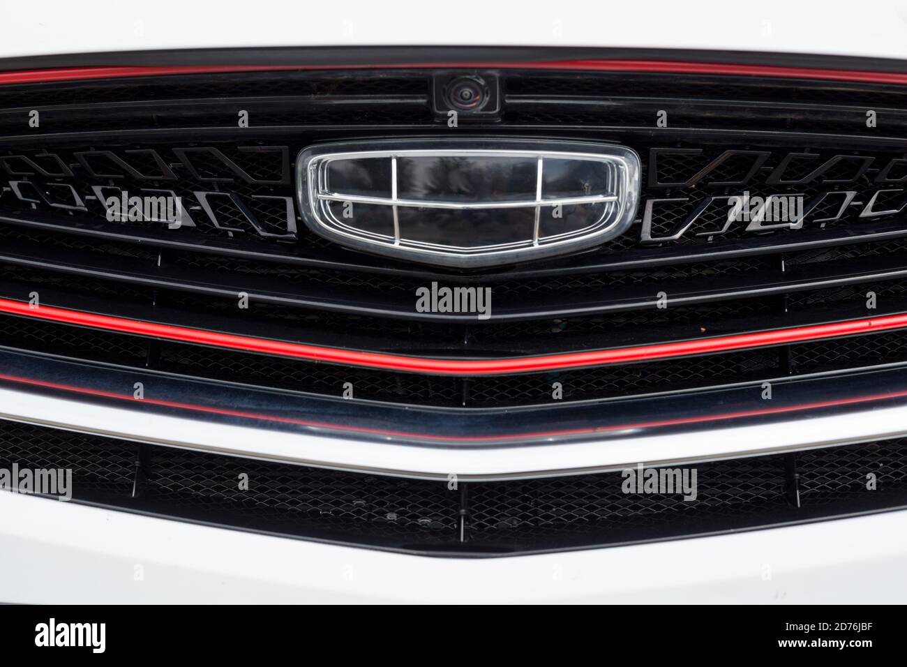 Russia, Izhevsk - August 14, 2020: Geely showroom. Logo of Geely brand on bumper of CoolRay car. Car manufacturer from China. Modern transportation. Stock Photo