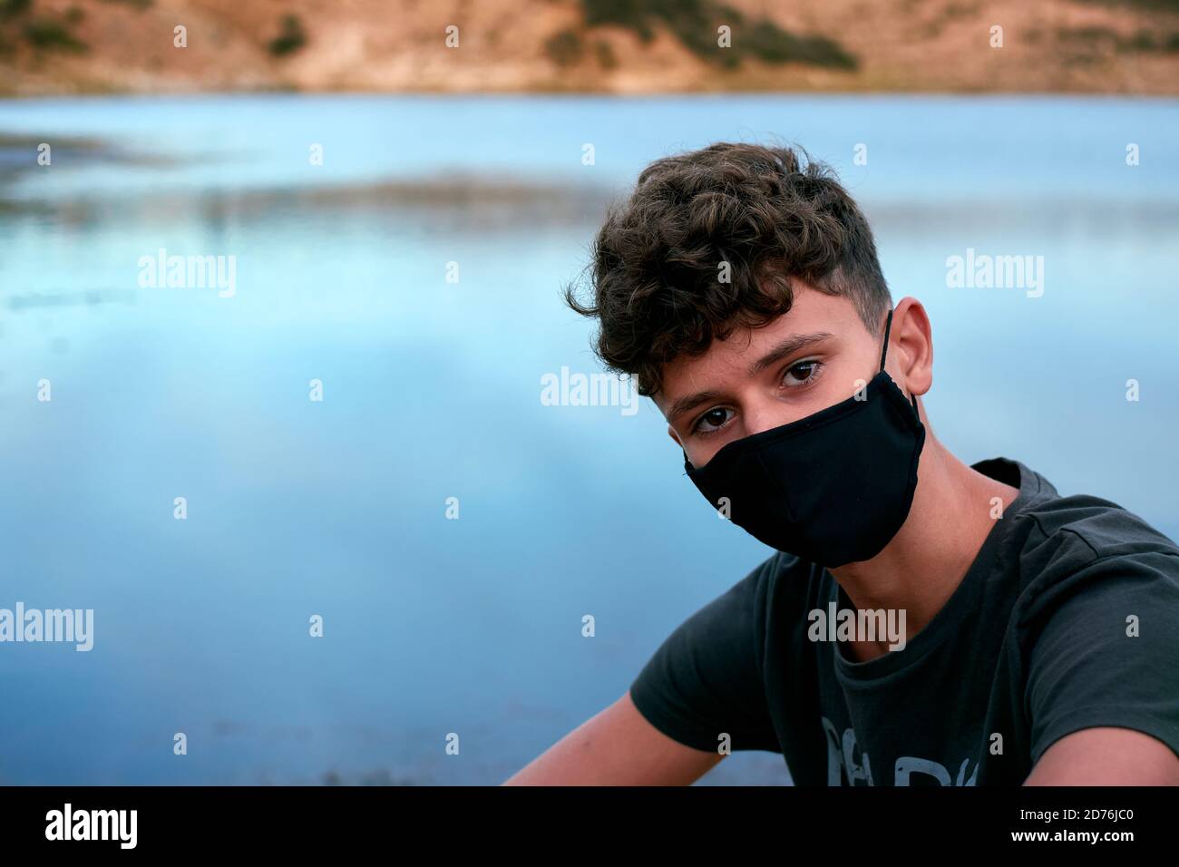 Young black person wearing coronavirus hi-res stock photography and ...