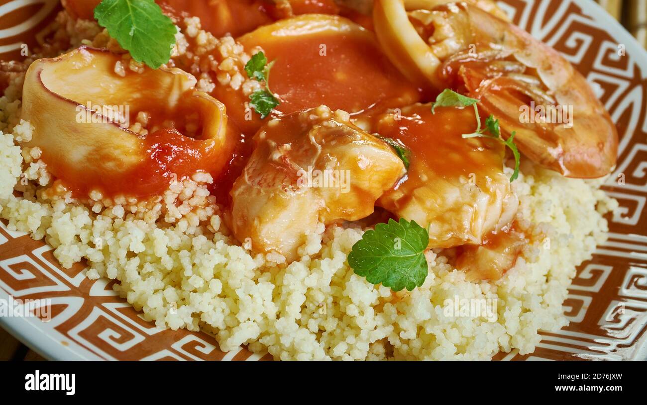 Seafood tagine Moroccan stew, served over a zesty almond couscous