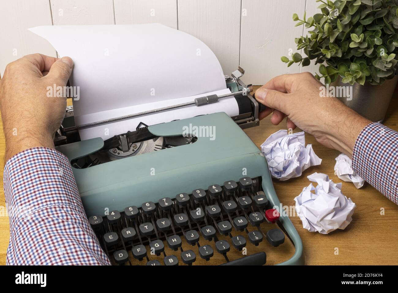 write with an old typewriter on a wooden  table Stock Photo