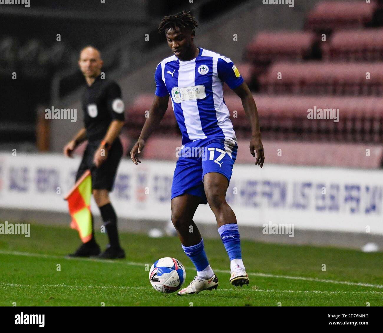 Viv Solomon-Otabor (17) of Wigan Athletic with the ball Stock Photo - Alamy
