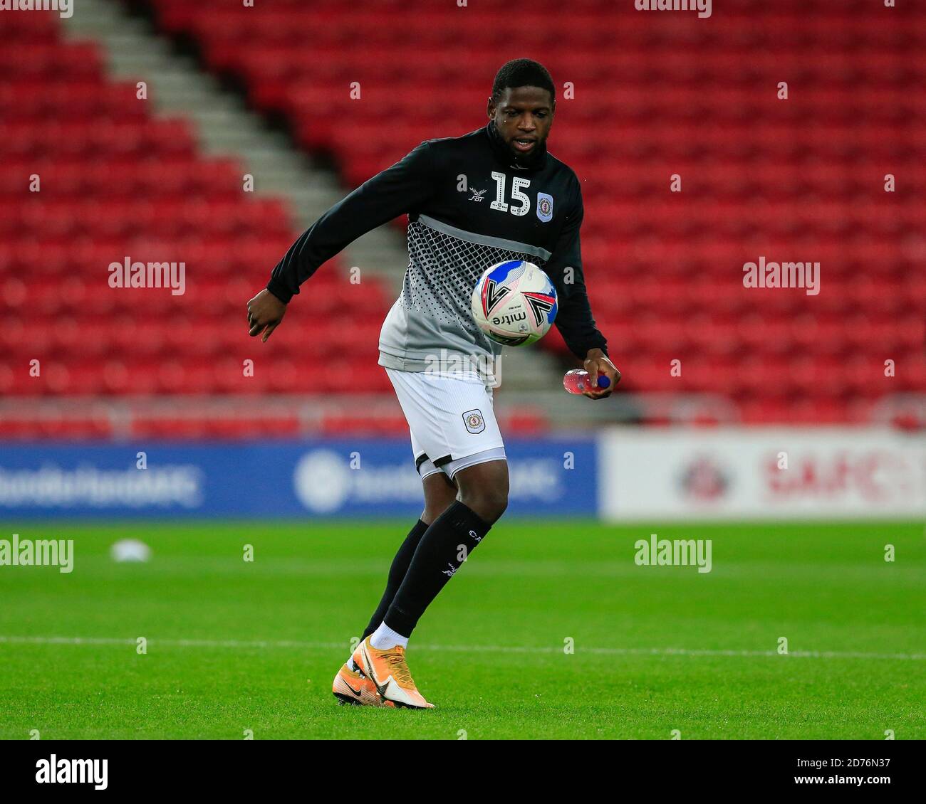 Offrande Zanzala (15) of Crewe Alexandra during the pre-game warmup Stock Photo