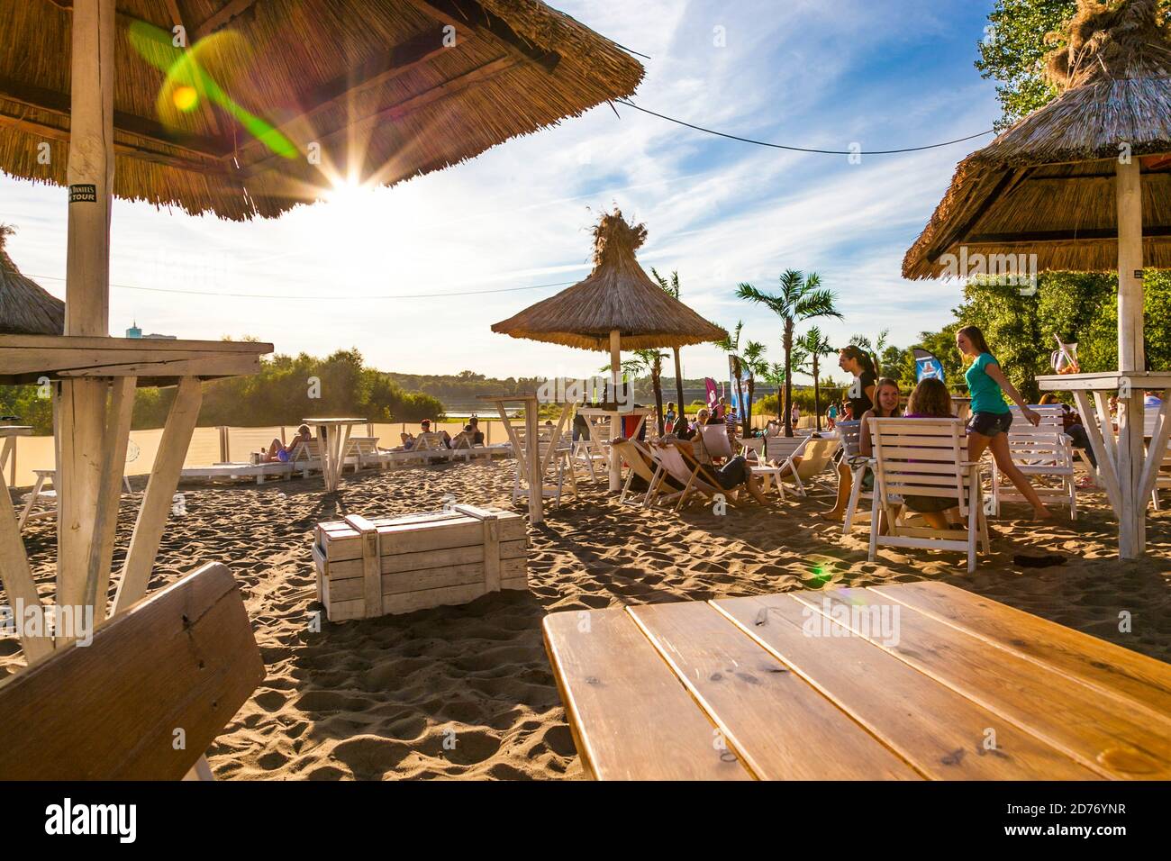Straw parasols at La Playa Beach Bar in Warsaw, Poland Stock Photo
