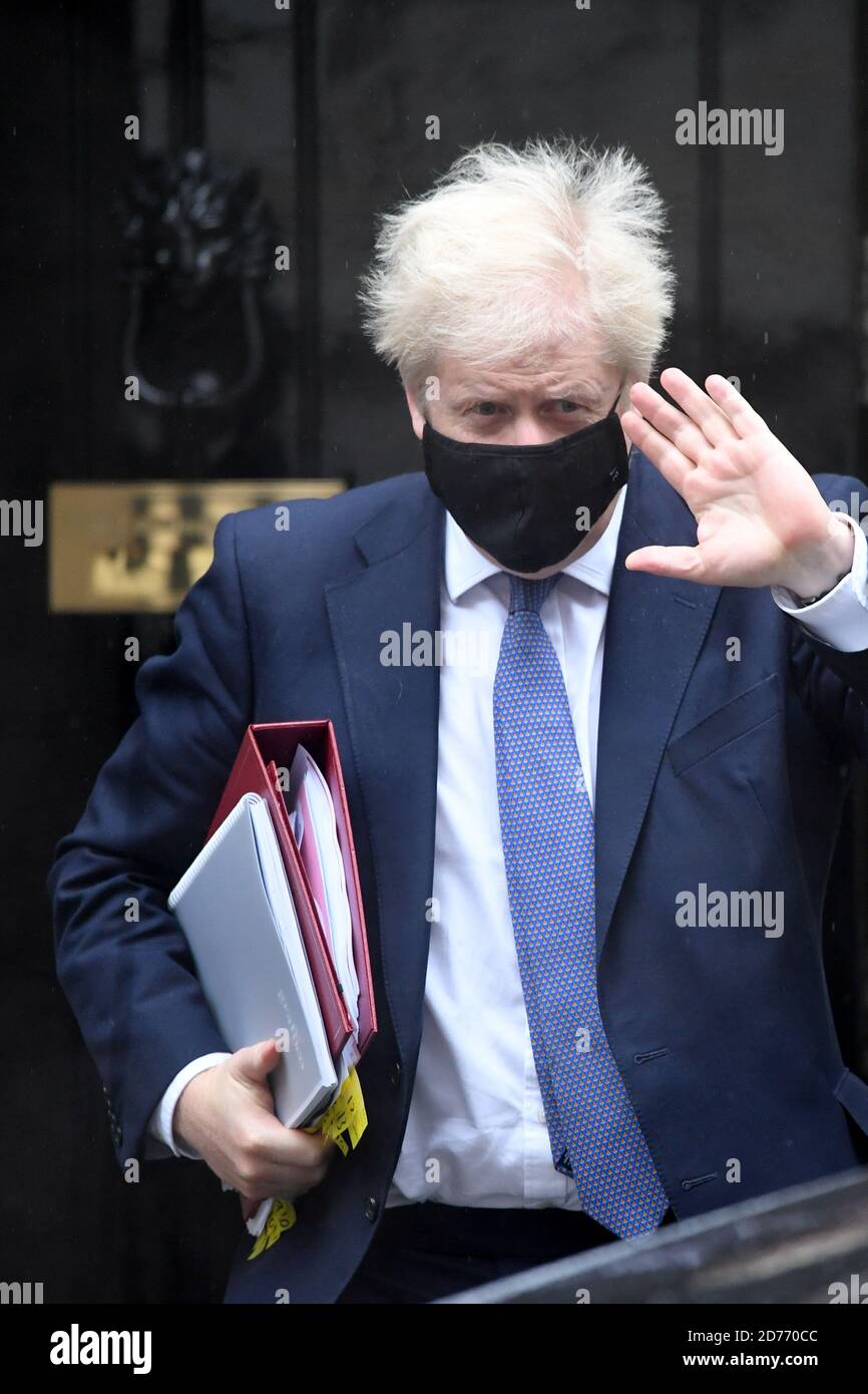 Prime Minister Boris Johnson leaves 10 Downing Street to attend Prime Minister's Questions, at the Houses of Parliament, London. Stock Photo